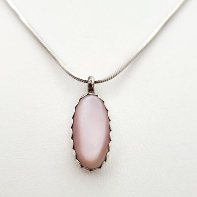 Charlotte Begay Sterling Necklace 4.9 Grams. This Navajo sterling silver necklace features an 
