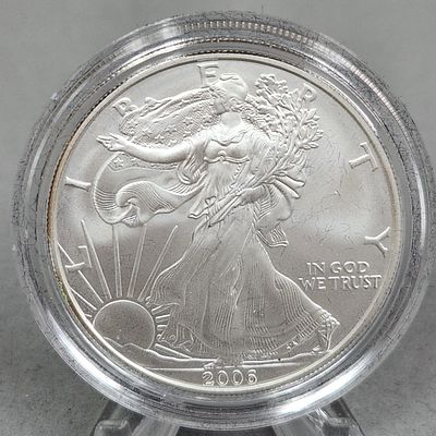 2006 American Eagle $1 Coin 31 Grams. This lot features a 2006 US American Silver Eagle one 