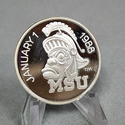1988 MSU Rose Bowl Silver Coin 1 Troy Oz. A 1 troy oz .999 fine silver round #02214 