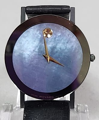 Movado Museum Watch #87-40-882N. This Swiss-made Movado Museum Ultra Thin wristwatch features a 