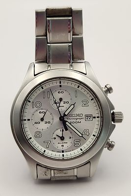 Seiko Quartz Chronograph Watch #7T62-0AH0. This Seiko chronograph wristwatch features a caliber 