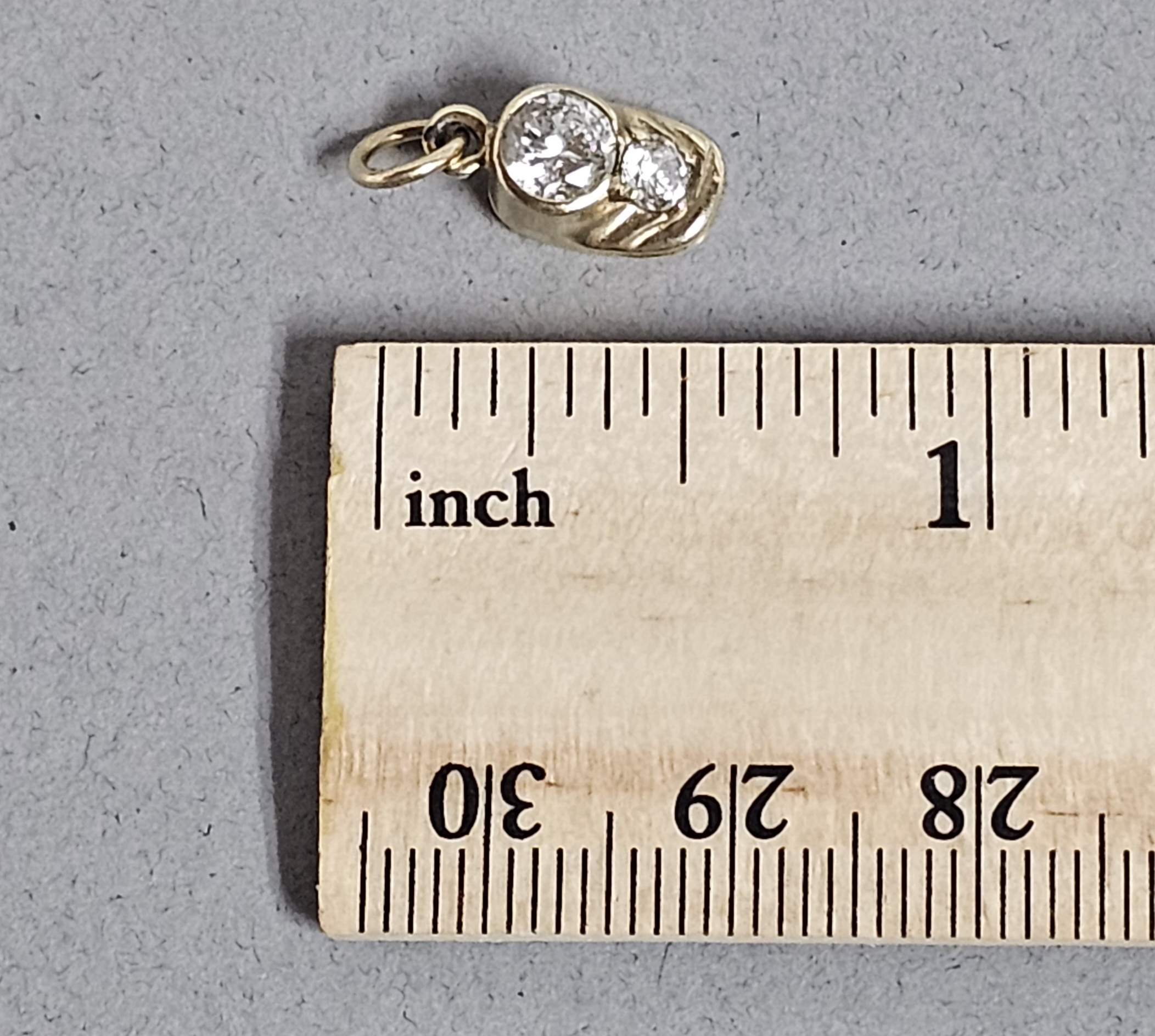10K Baby Shoe Charm with Clear Stones 1.4 Grams