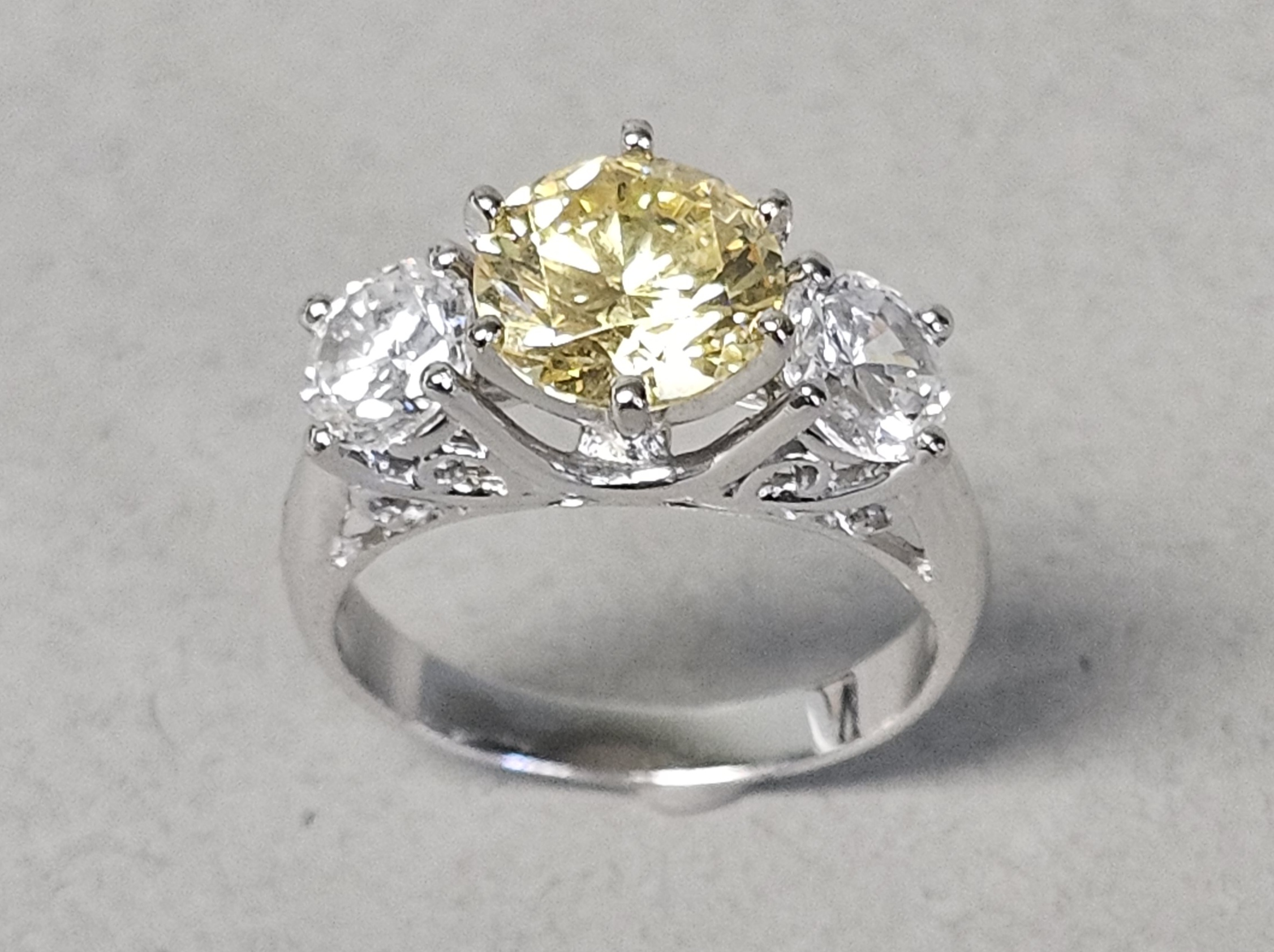 Sterling Ring with Yellow & Colorless Stones 4.0 Grams