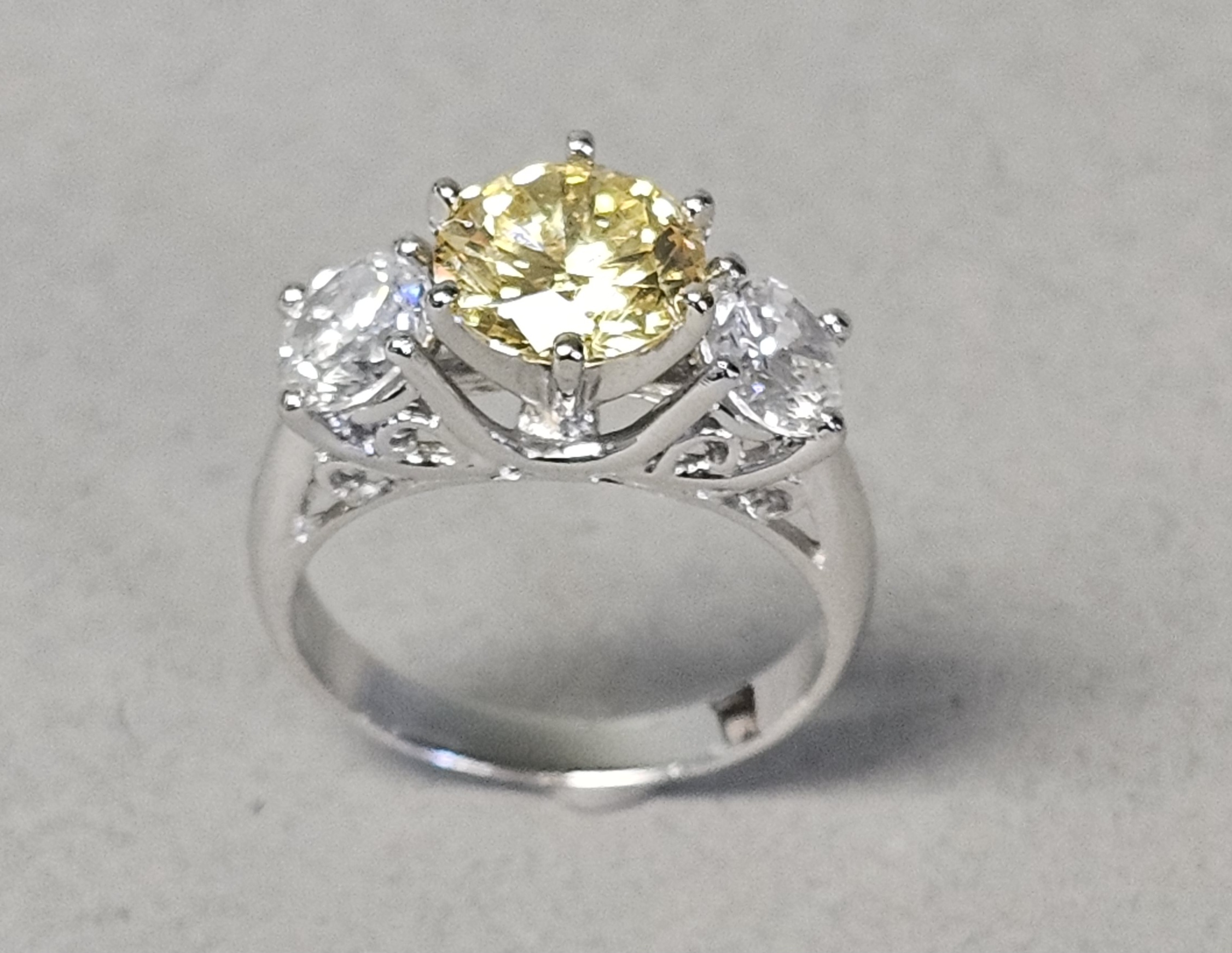 Sterling Ring with Yellow & Colorless Stones 4.0 Grams