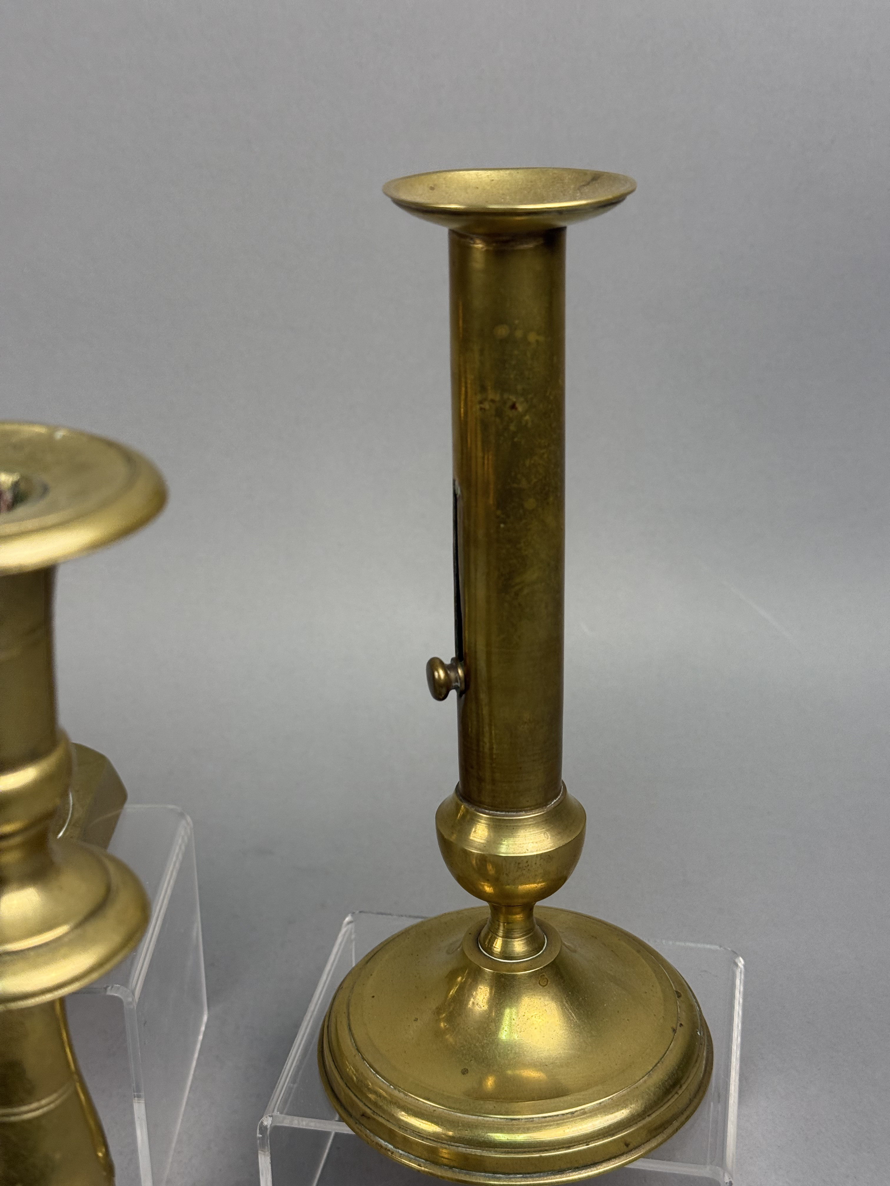 Assorted Brass Candlesticks and a Bud Vase