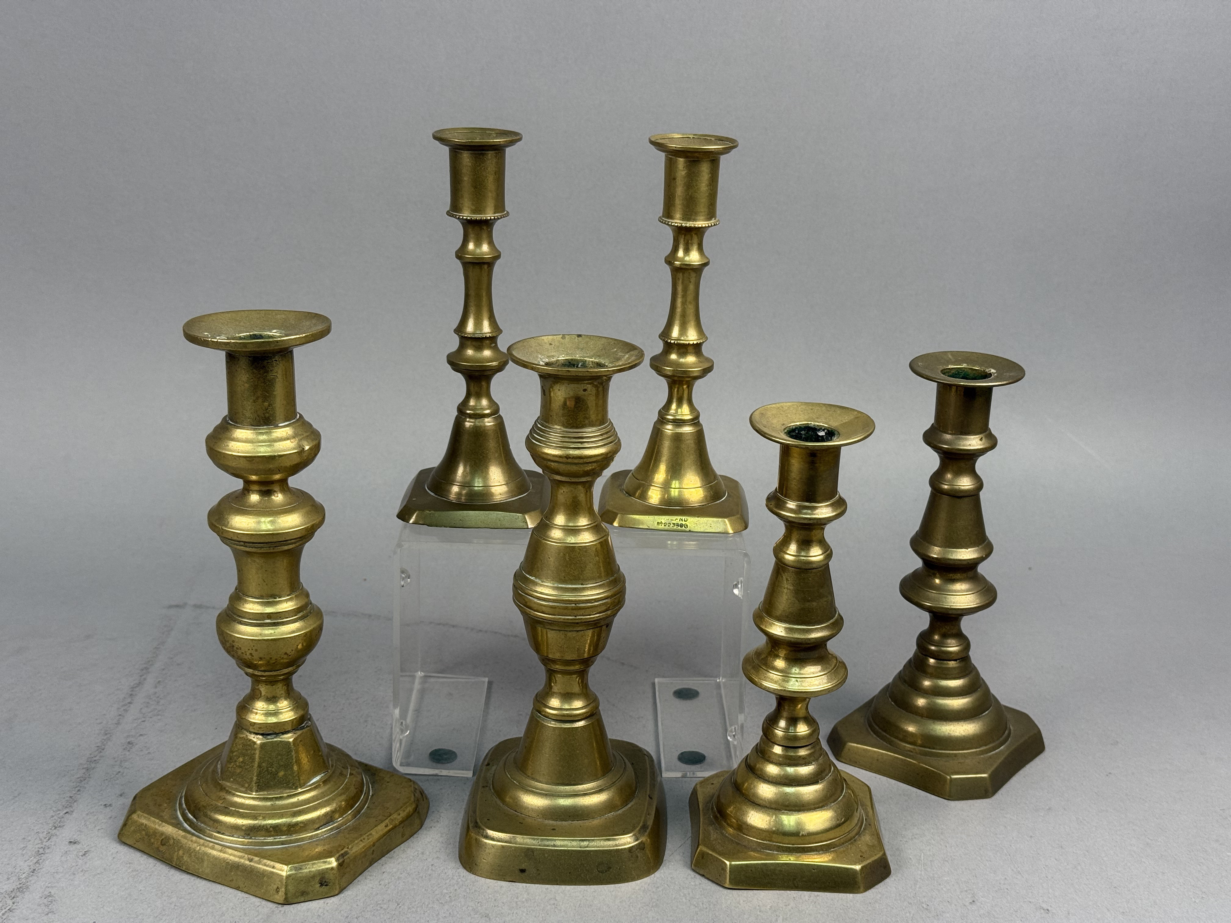 Six Brass Candlesticks