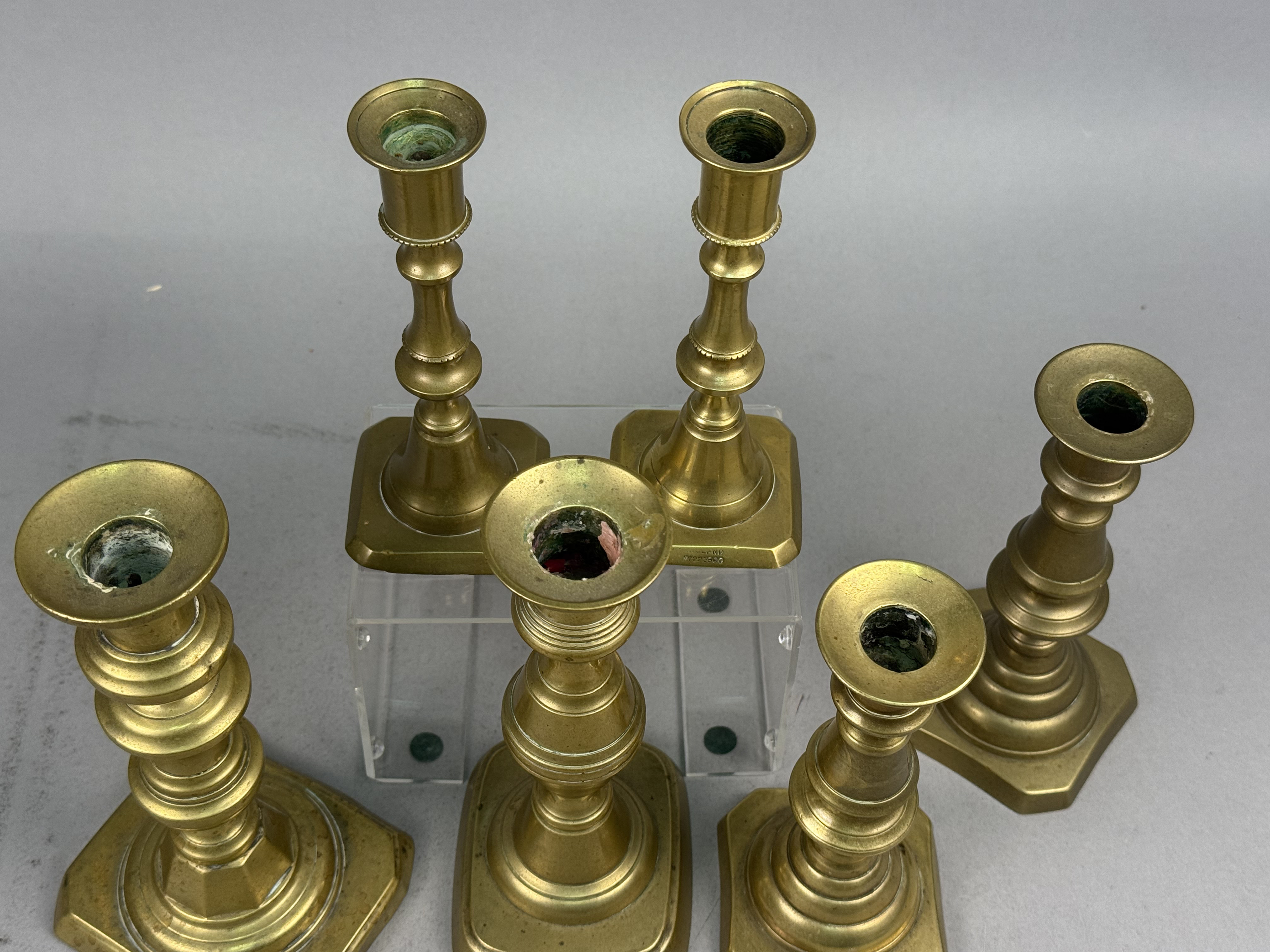 Six Brass Candlesticks