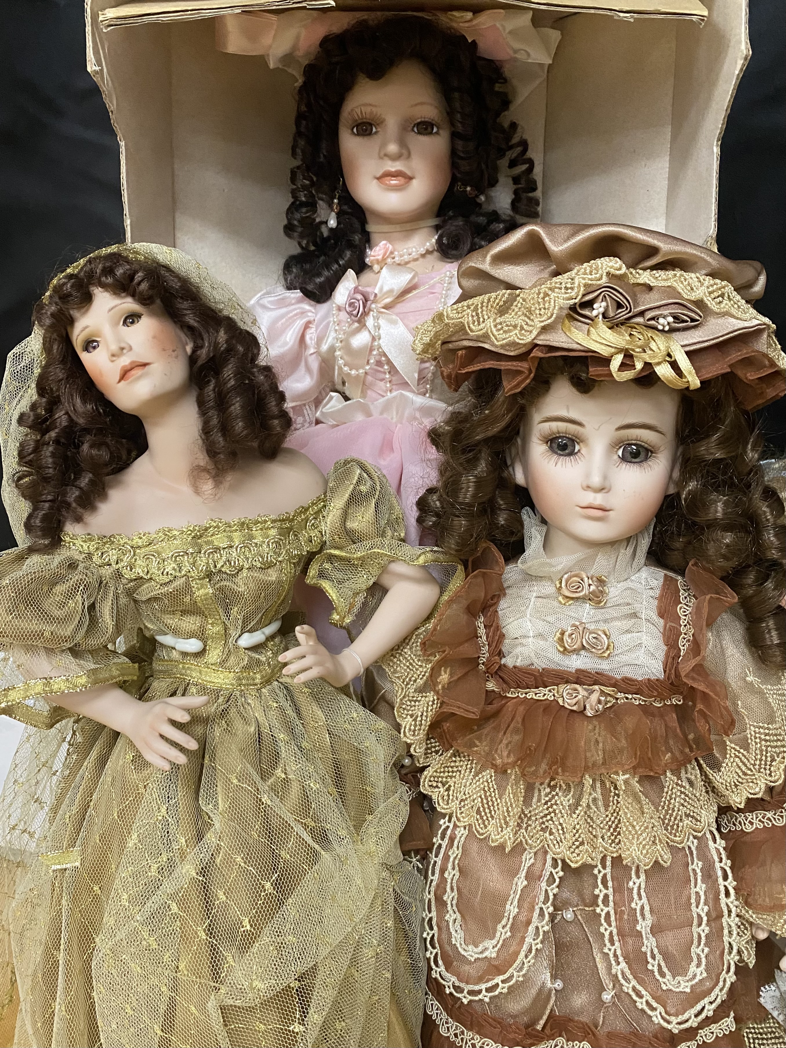 12 Porcelain Collector Dolls