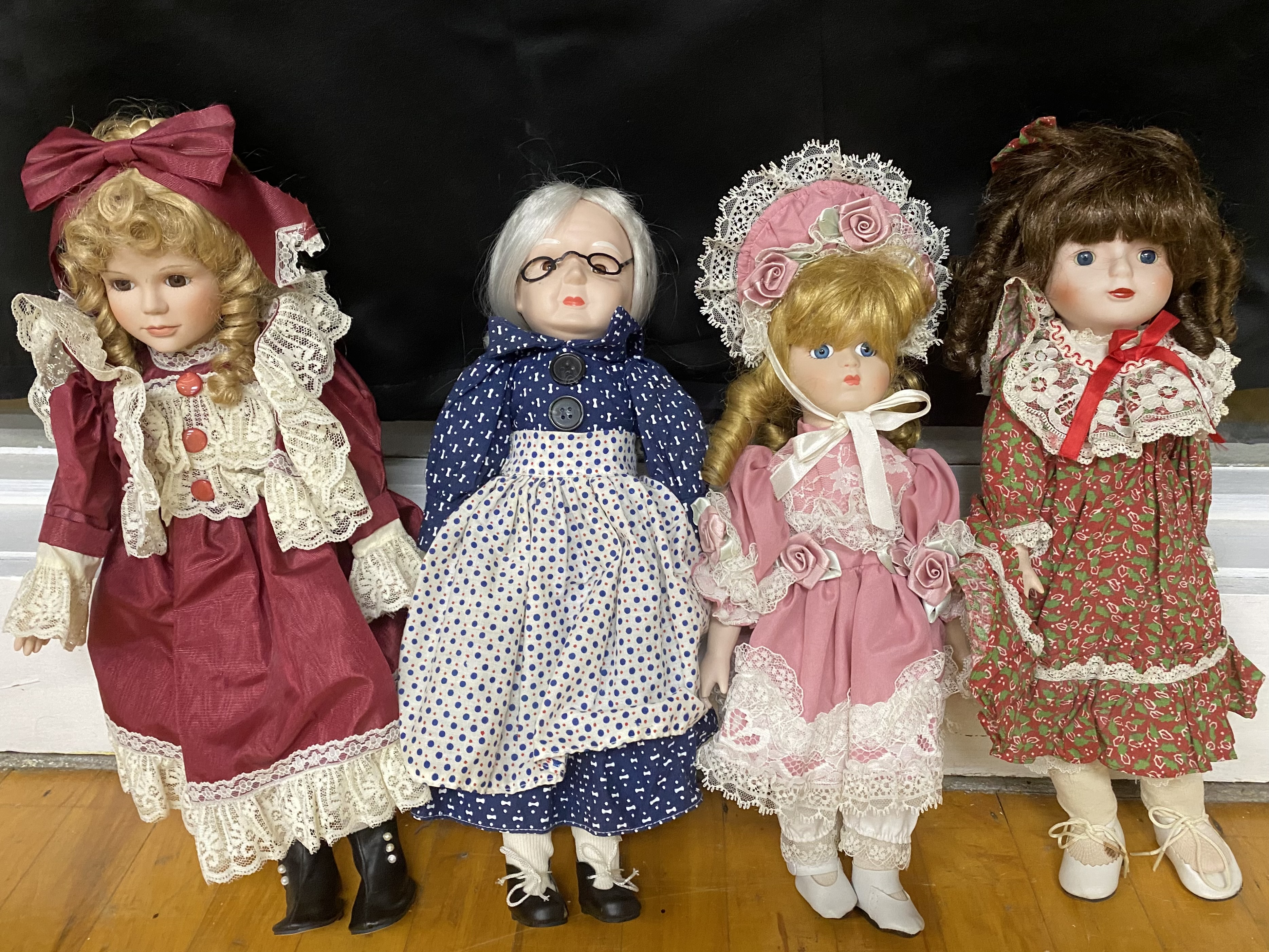 12 Porcelain Collector Dolls