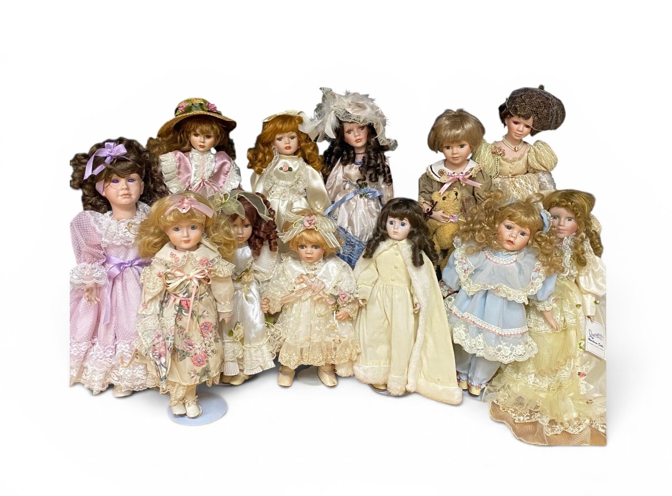 12 Colletible Porcelain Bisque Dolls