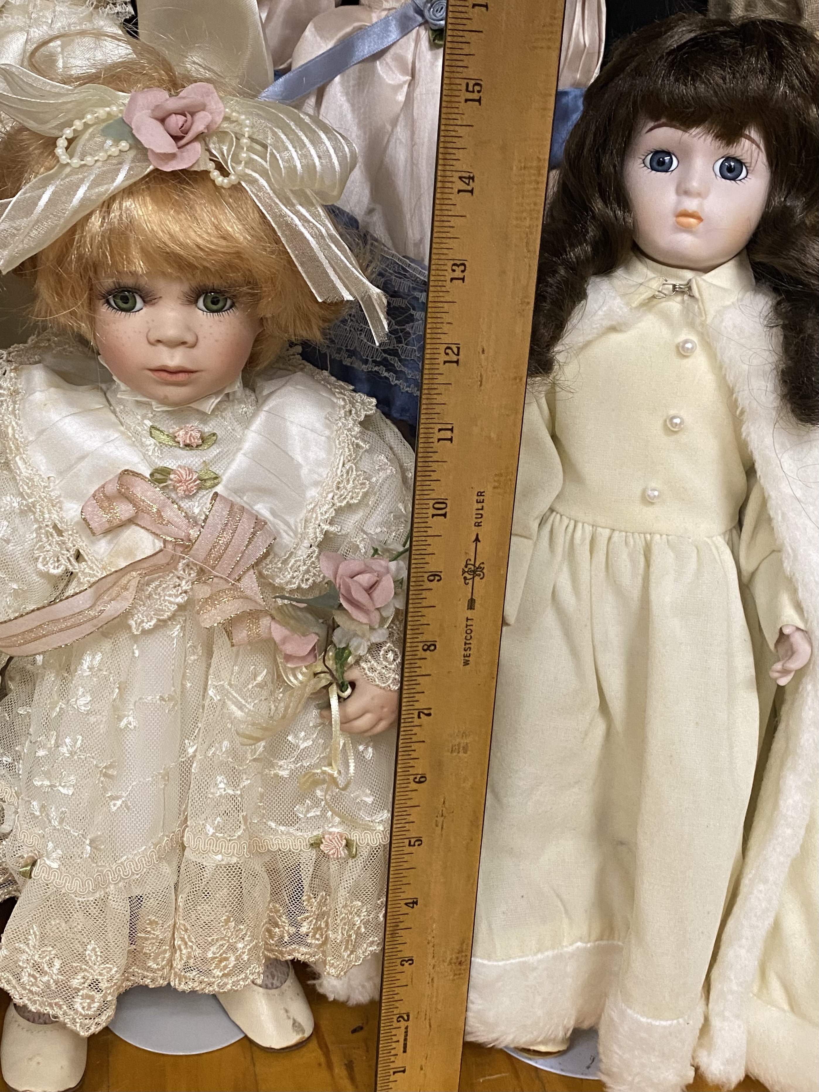 12 Colletible Porcelain Bisque Dolls