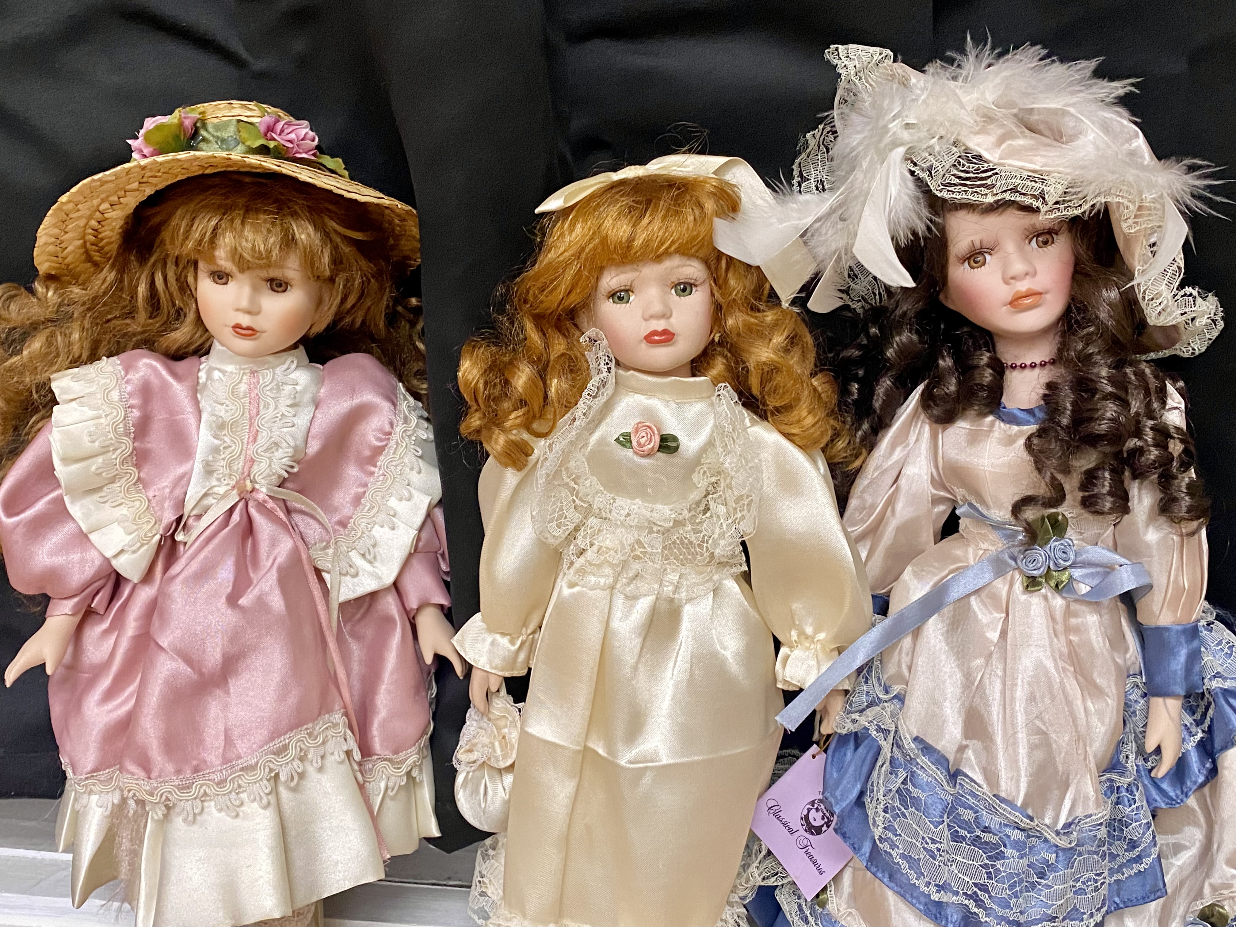 12 Colletible Porcelain Bisque Dolls