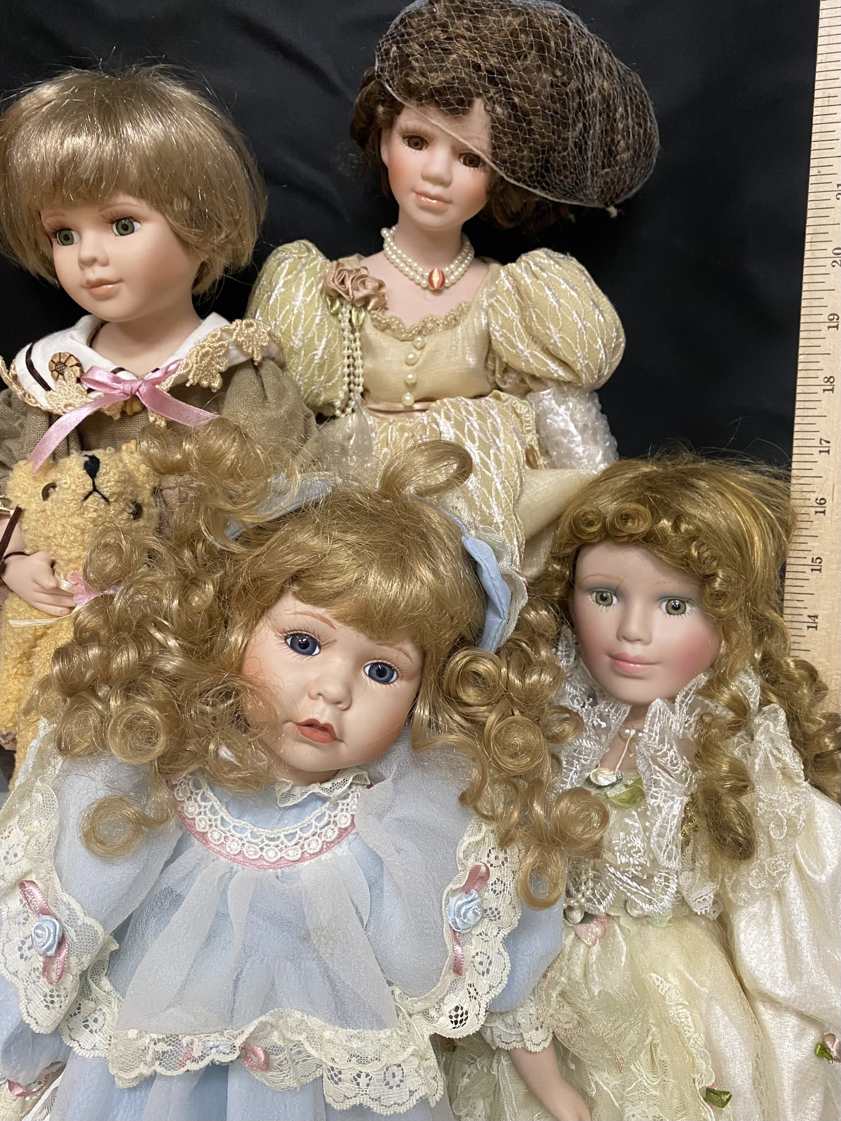 12 Colletible Porcelain Bisque Dolls