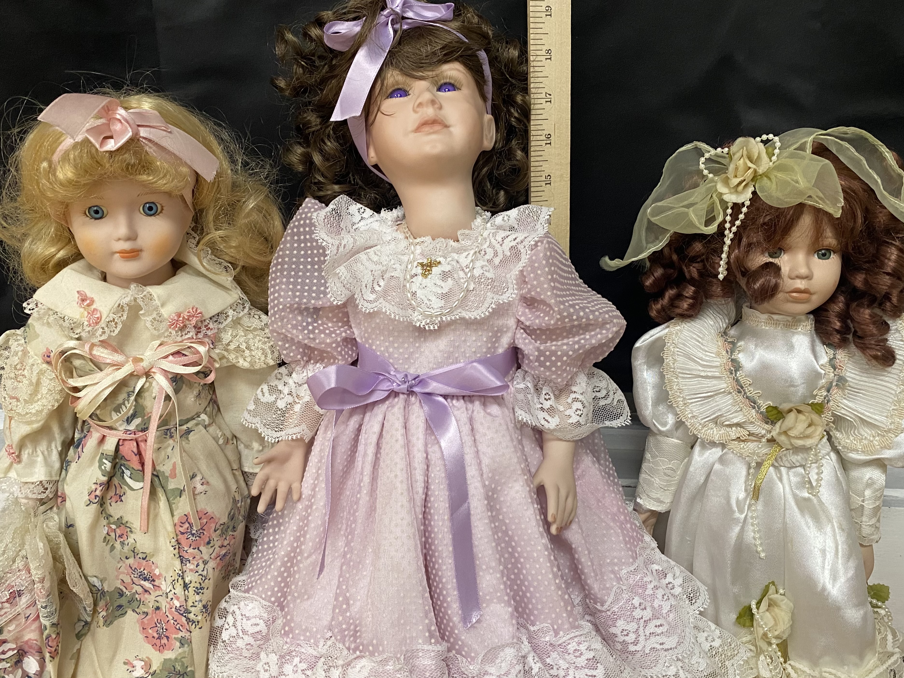12 Colletible Porcelain Bisque Dolls