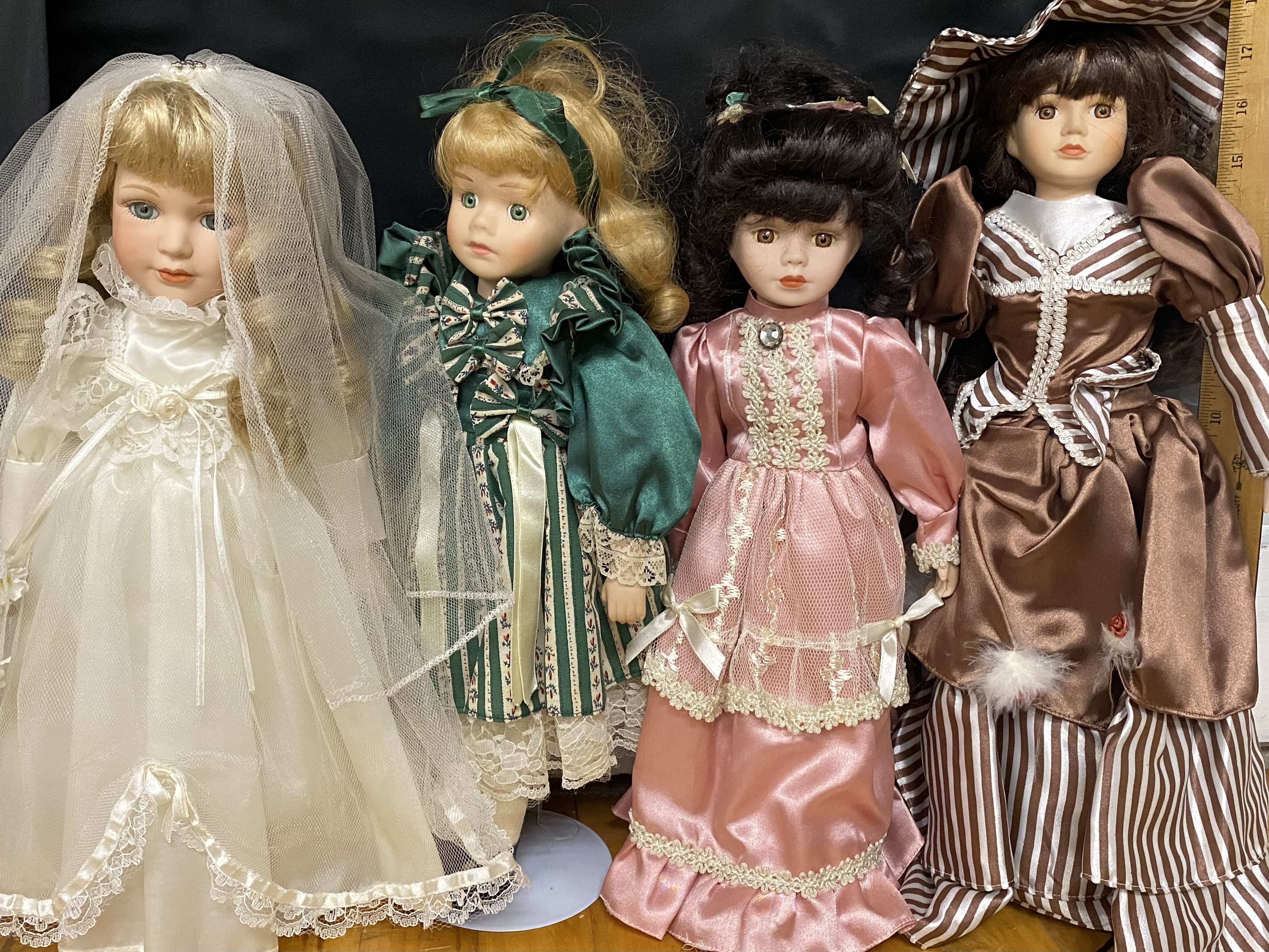12 Contemporary Collectible Porcelain Dolls