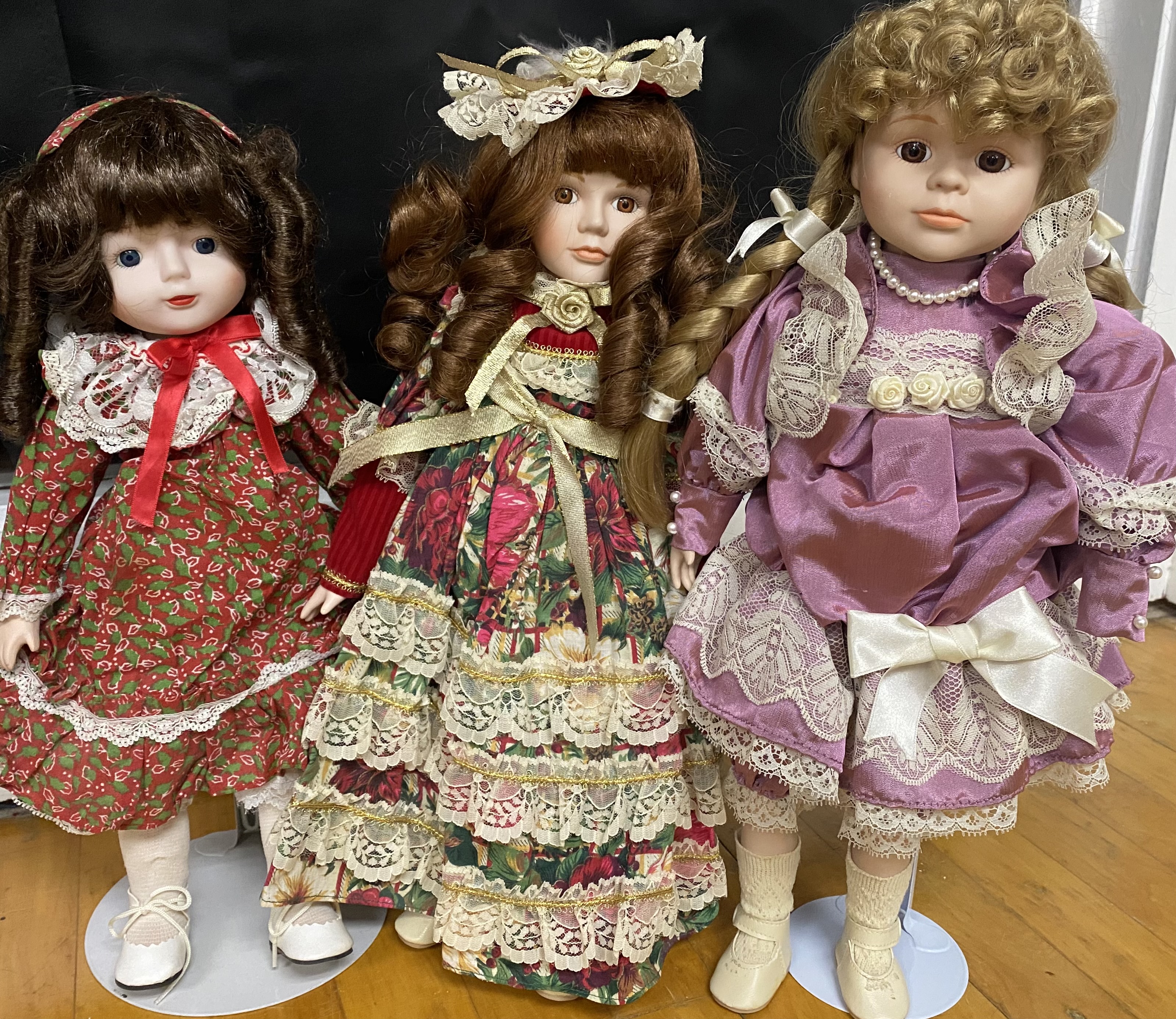 12 Contemporary Collectible Porcelain Dolls