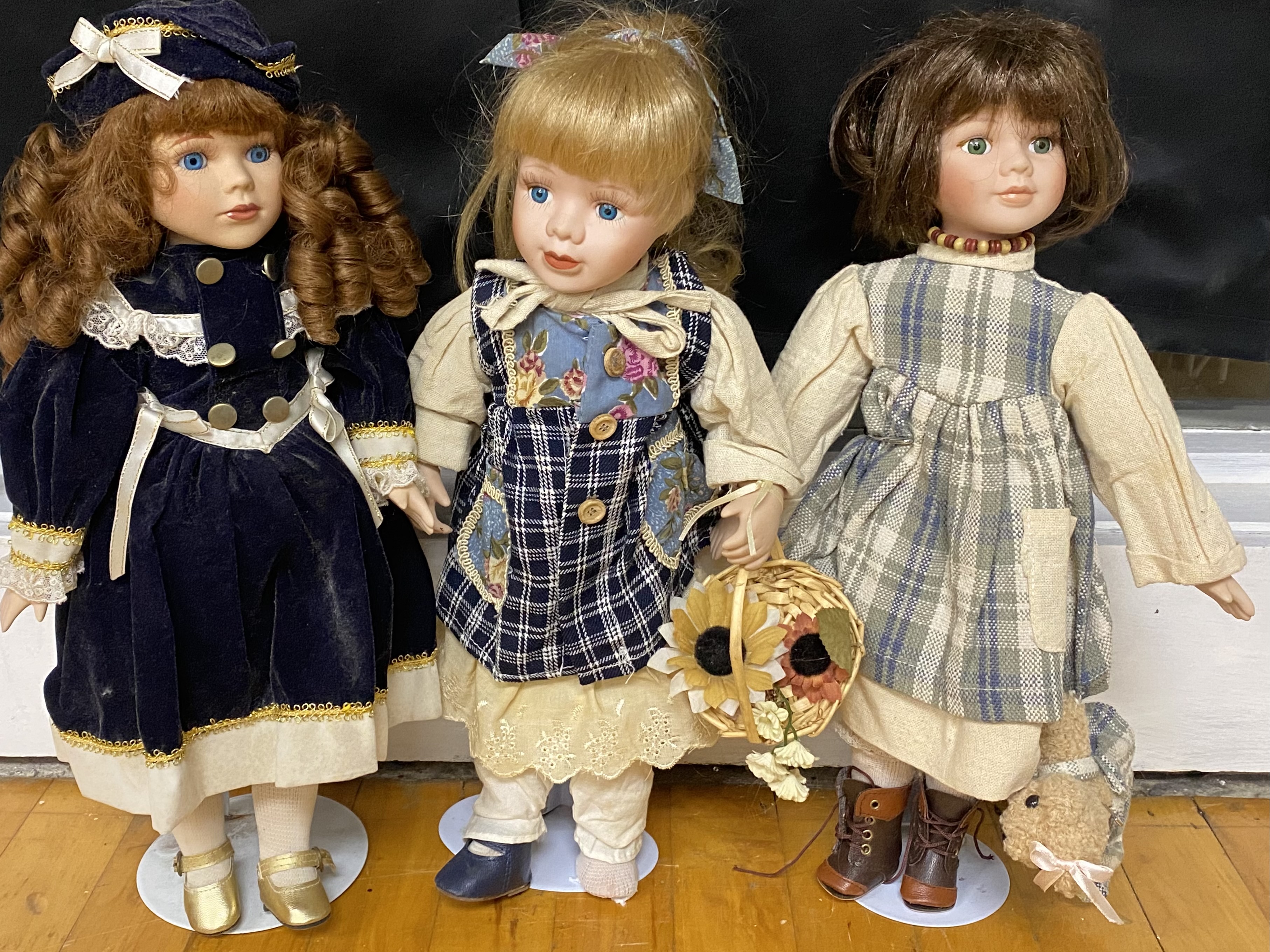 12 Contemporary Collectible Porcelain Dolls