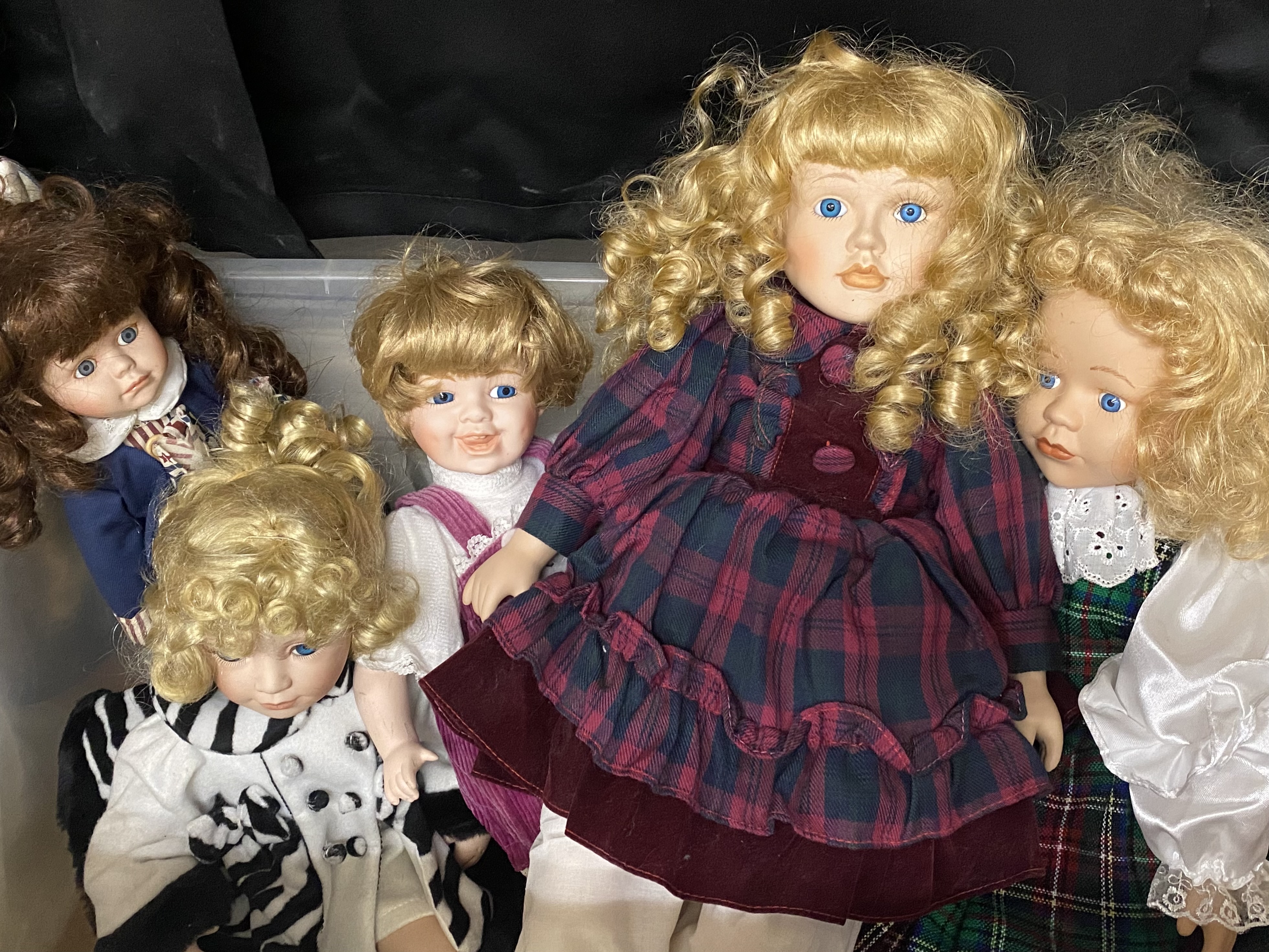 12 Contemporary Collectible Porcelain Dolls