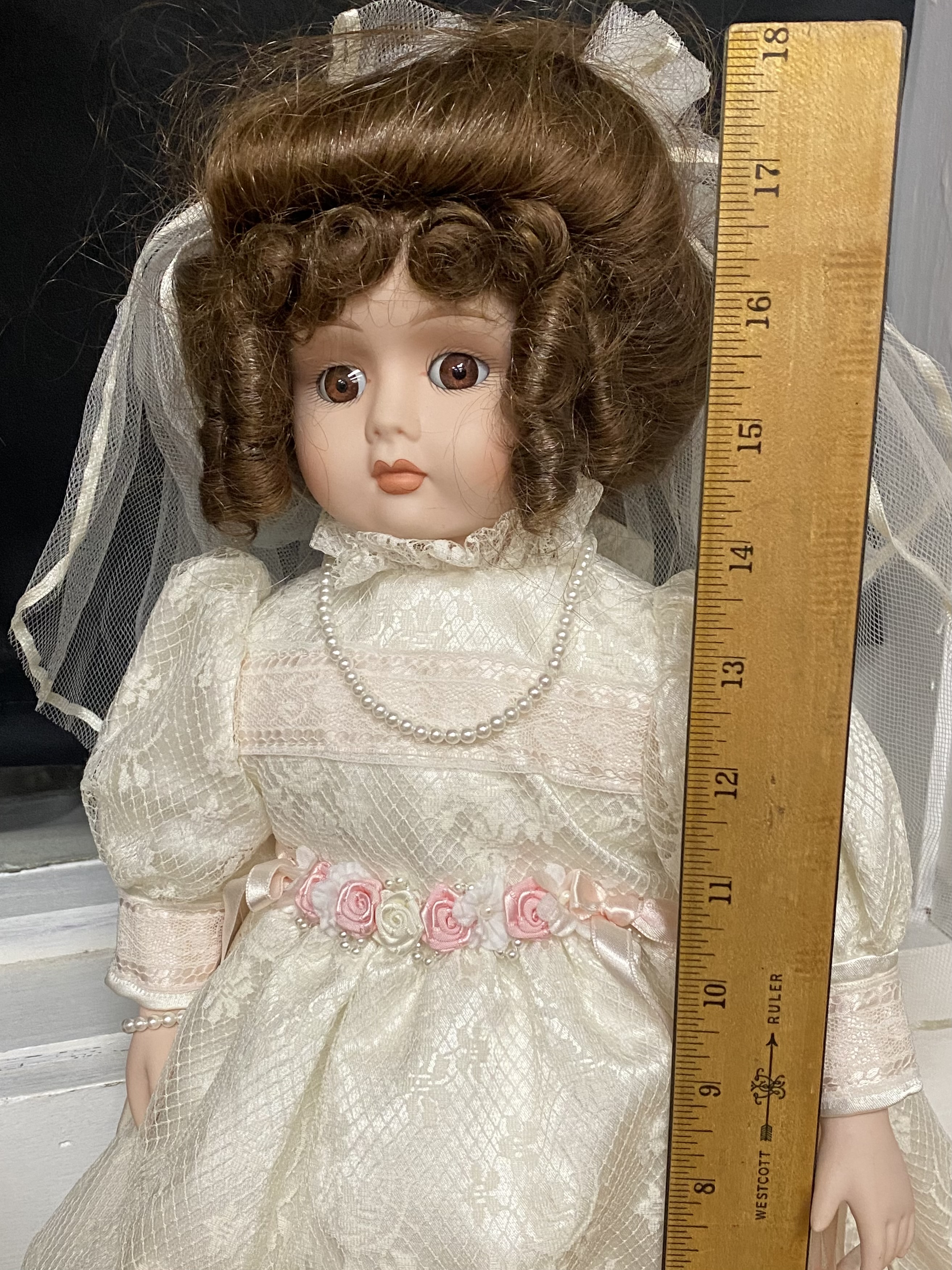 12 Contemporary Collectible Porcelain Dolls