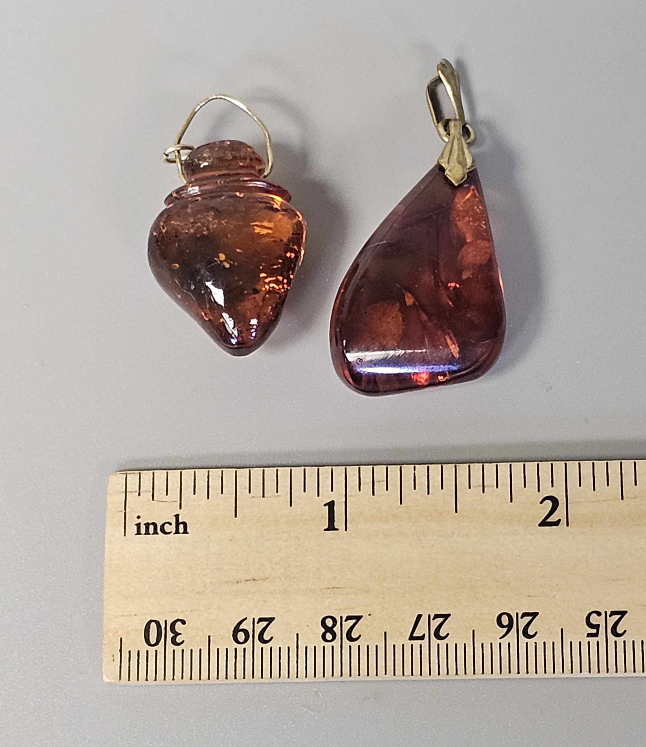 Two Translucent Cognac Amber Pendants