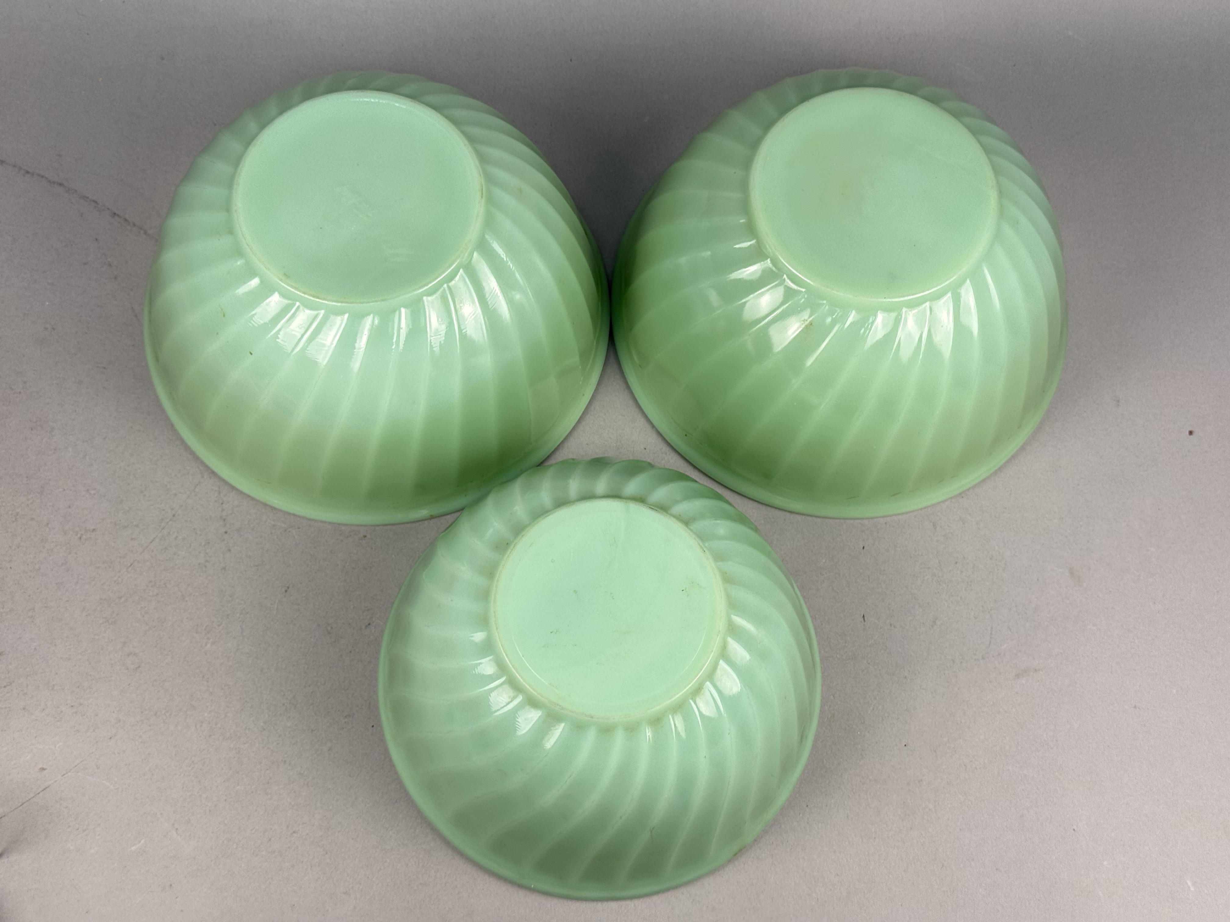 A Trio of Fire-King Jadeite Swirl Mixing Bowls