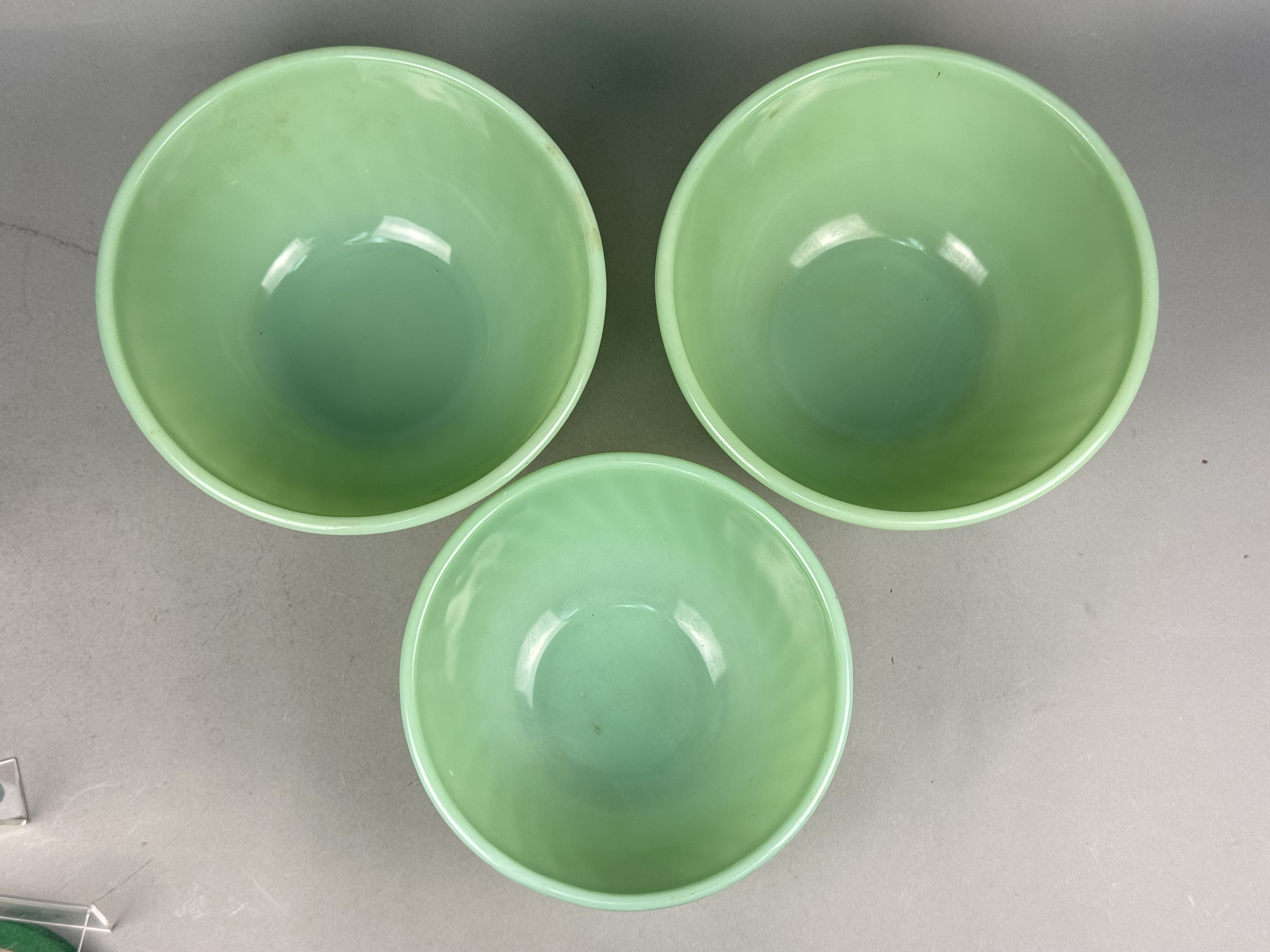 A Trio of Fire-King Jadeite Swirl Mixing Bowls