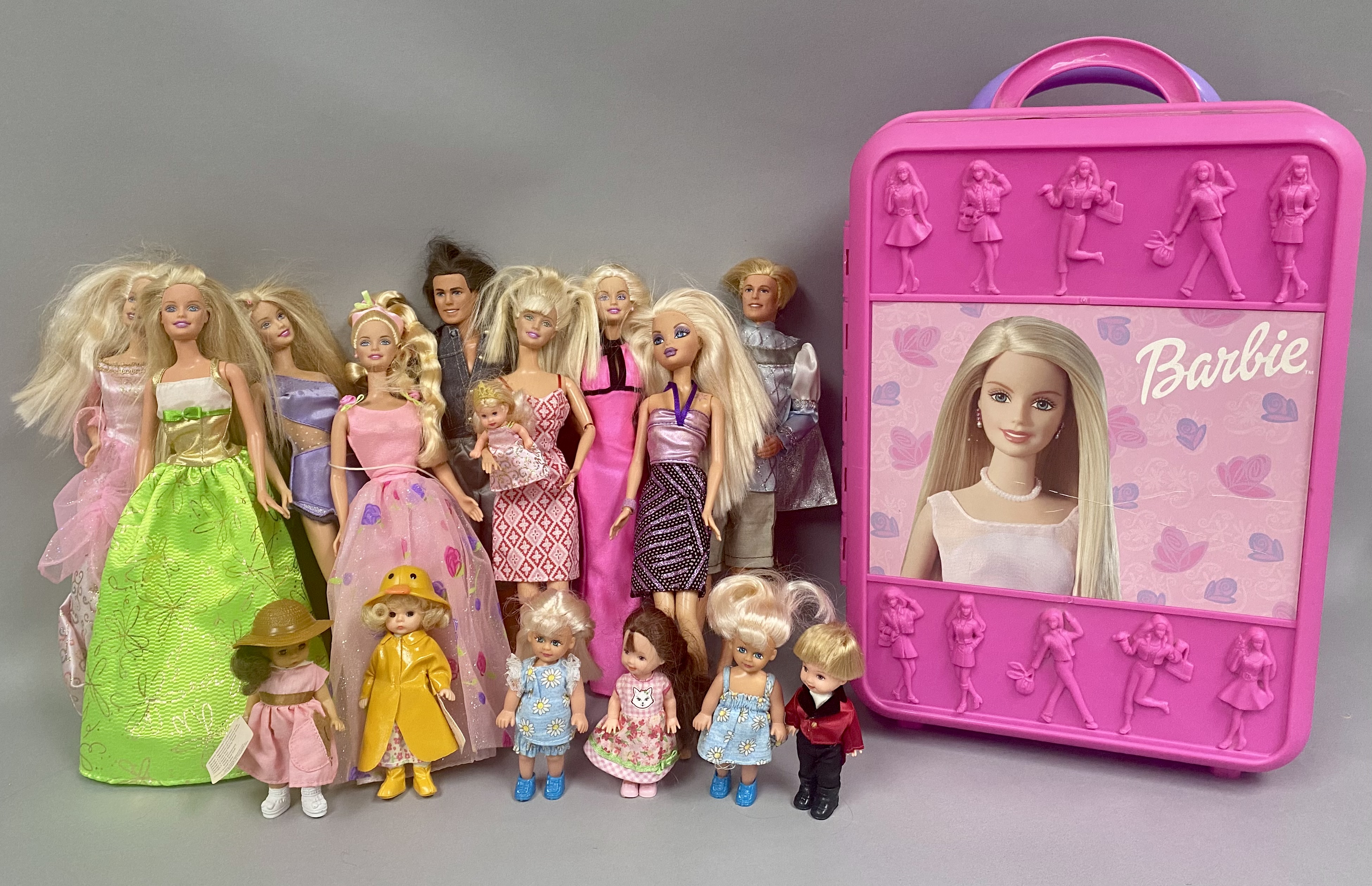 Barbie Dolls, Rolling Trunk, and Accessories