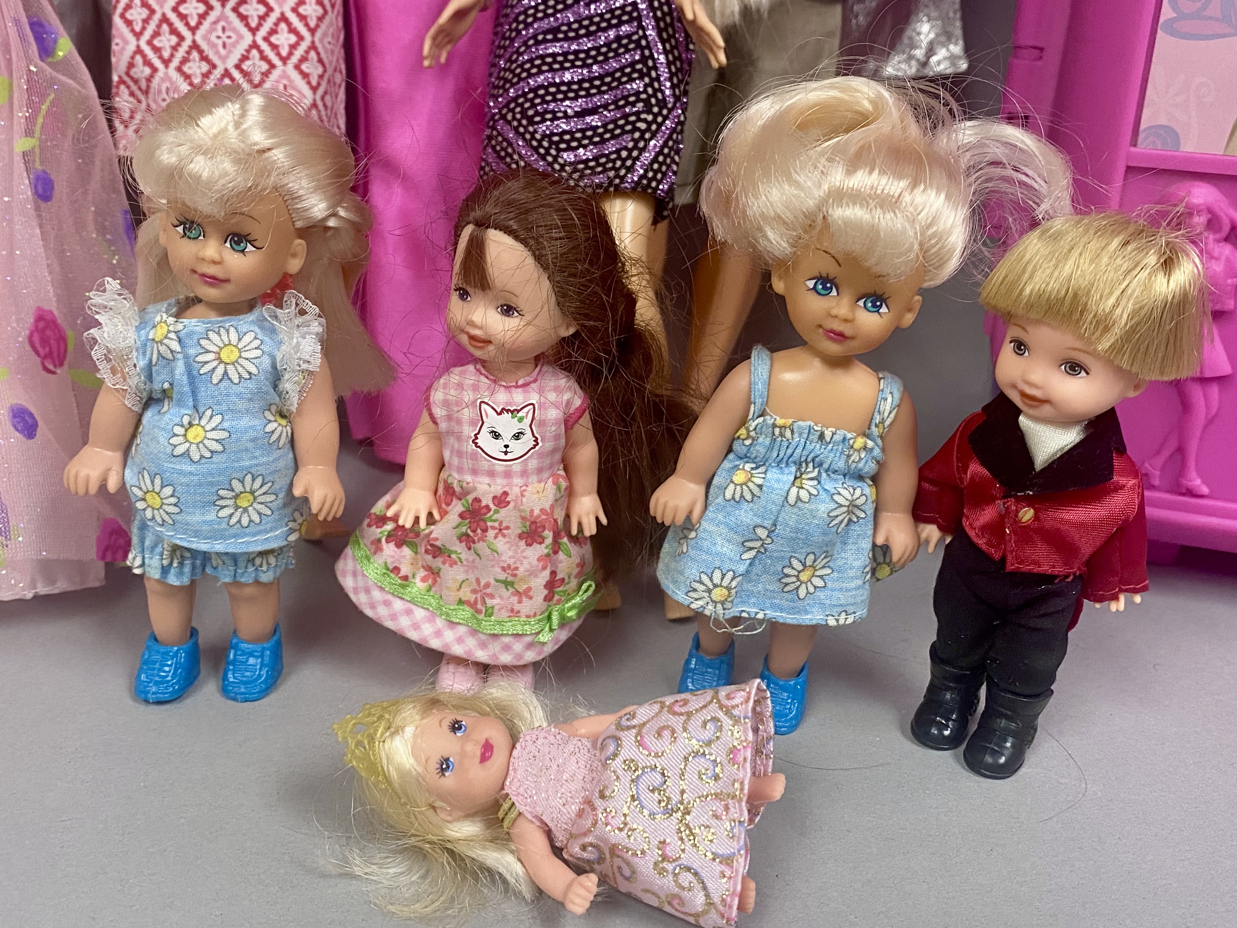 Barbie Dolls, Rolling Trunk, and Accessories