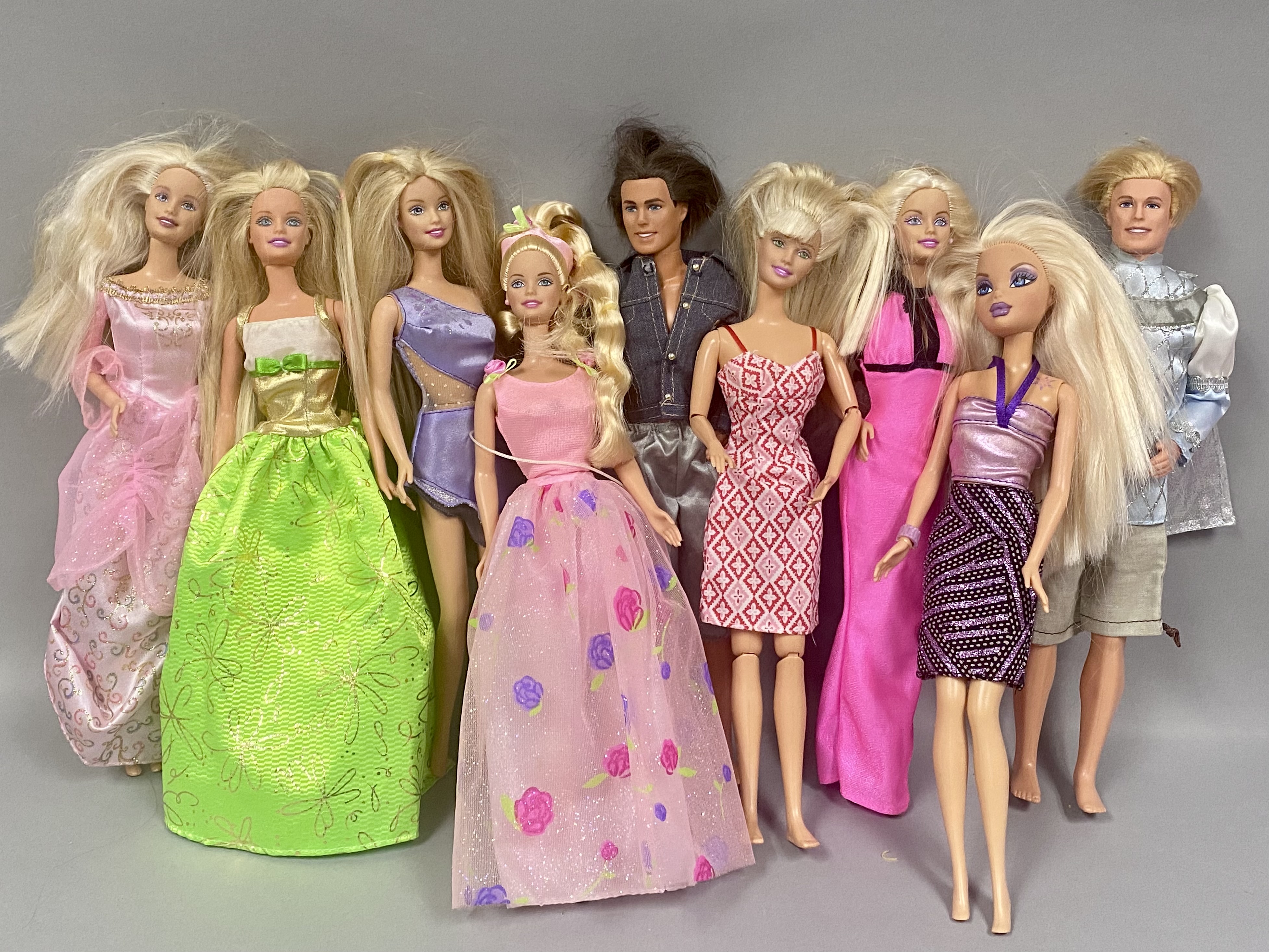 Barbie Dolls, Rolling Trunk, and Accessories