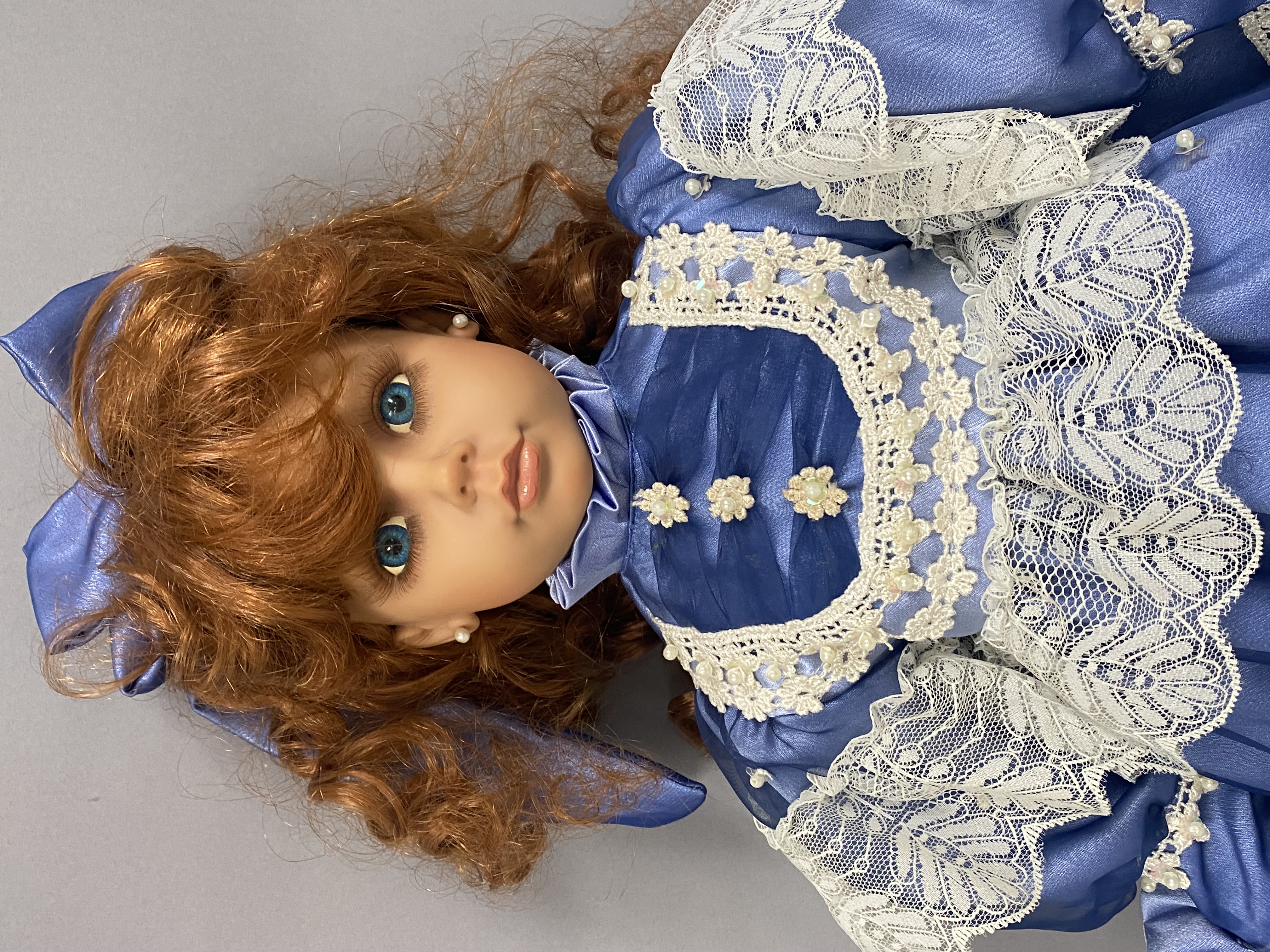 Two Collectible Vinyl Dolls