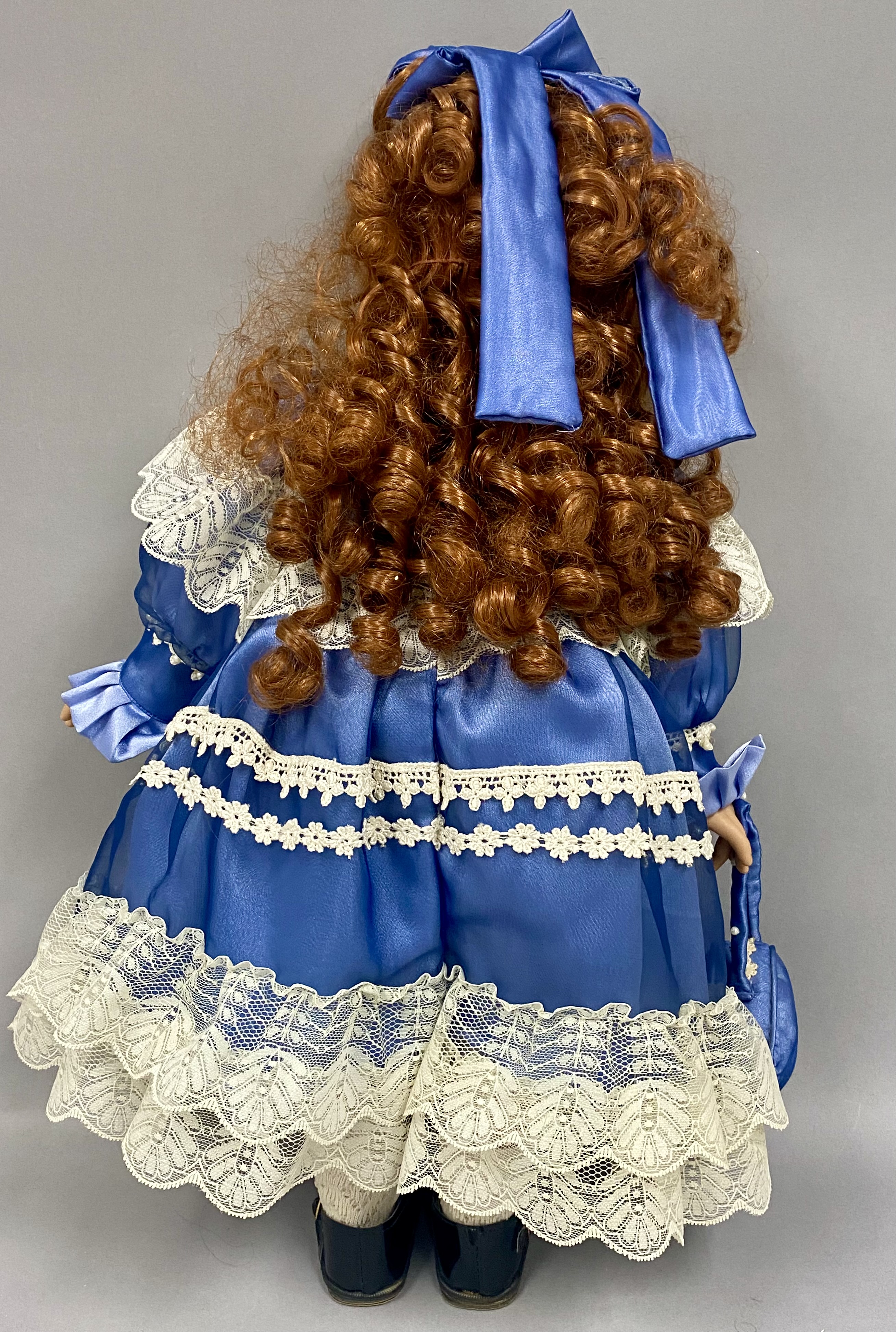 Two Collectible Vinyl Dolls