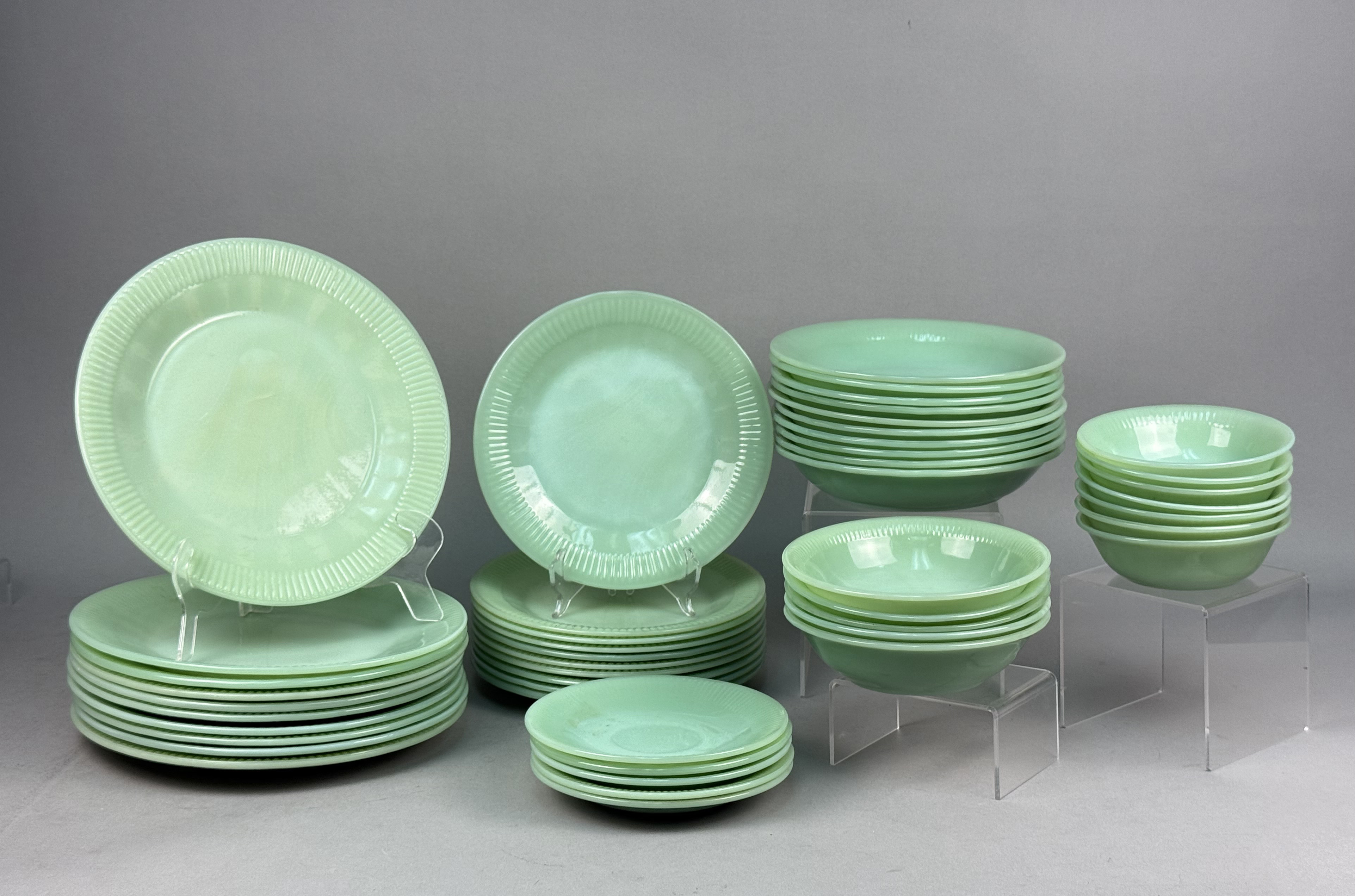 A Large Set of Fire-King Jadeite Dinnerware