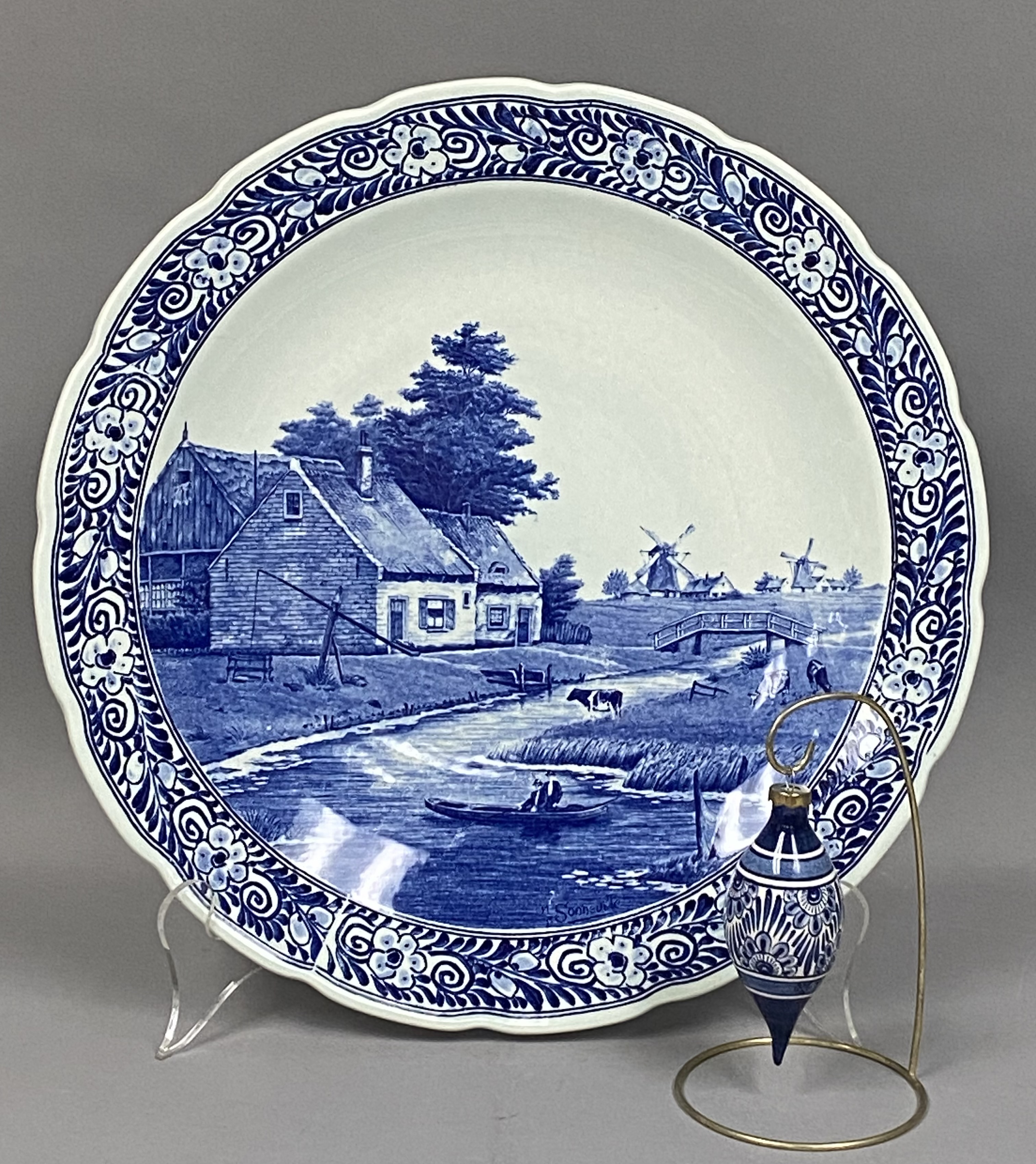 2 Pieces of Delft Pottery Inc a Royal Sphinx Maastricht Charger