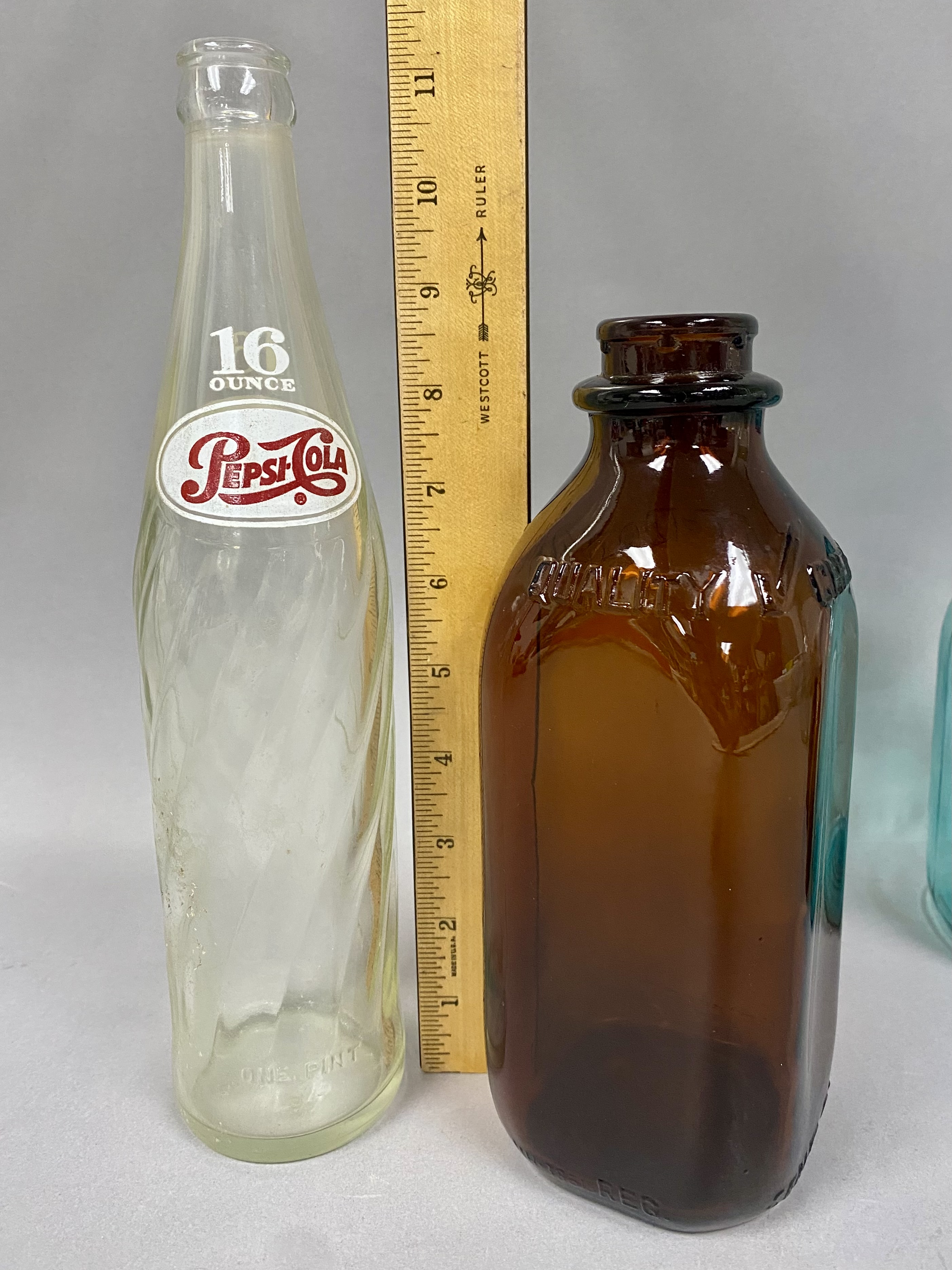 Six Vintage American Glass Bottles and Jars