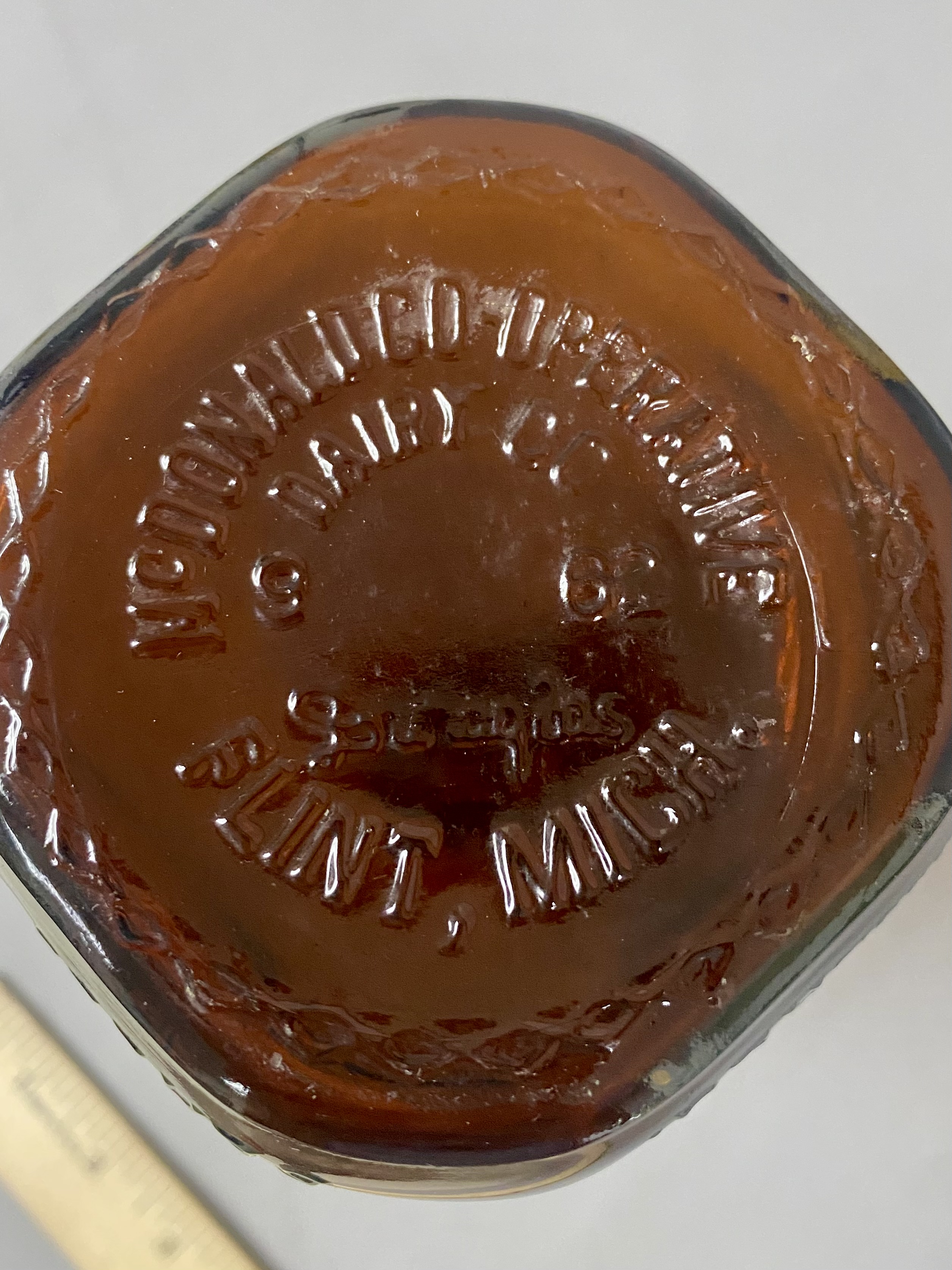 Six Vintage American Glass Bottles and Jars