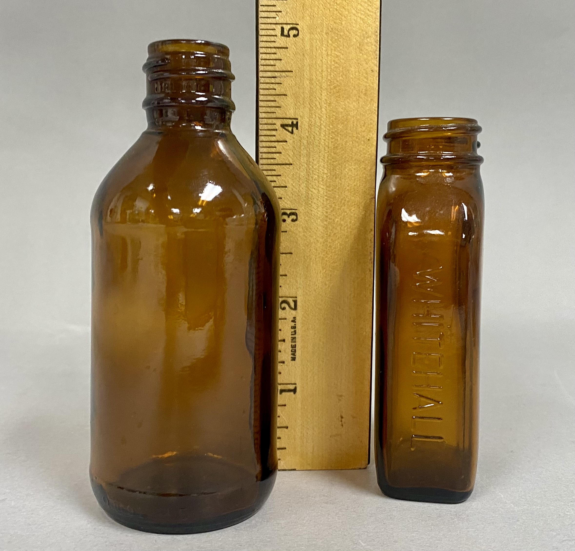 Six Vintage American Glass Bottles and Jars