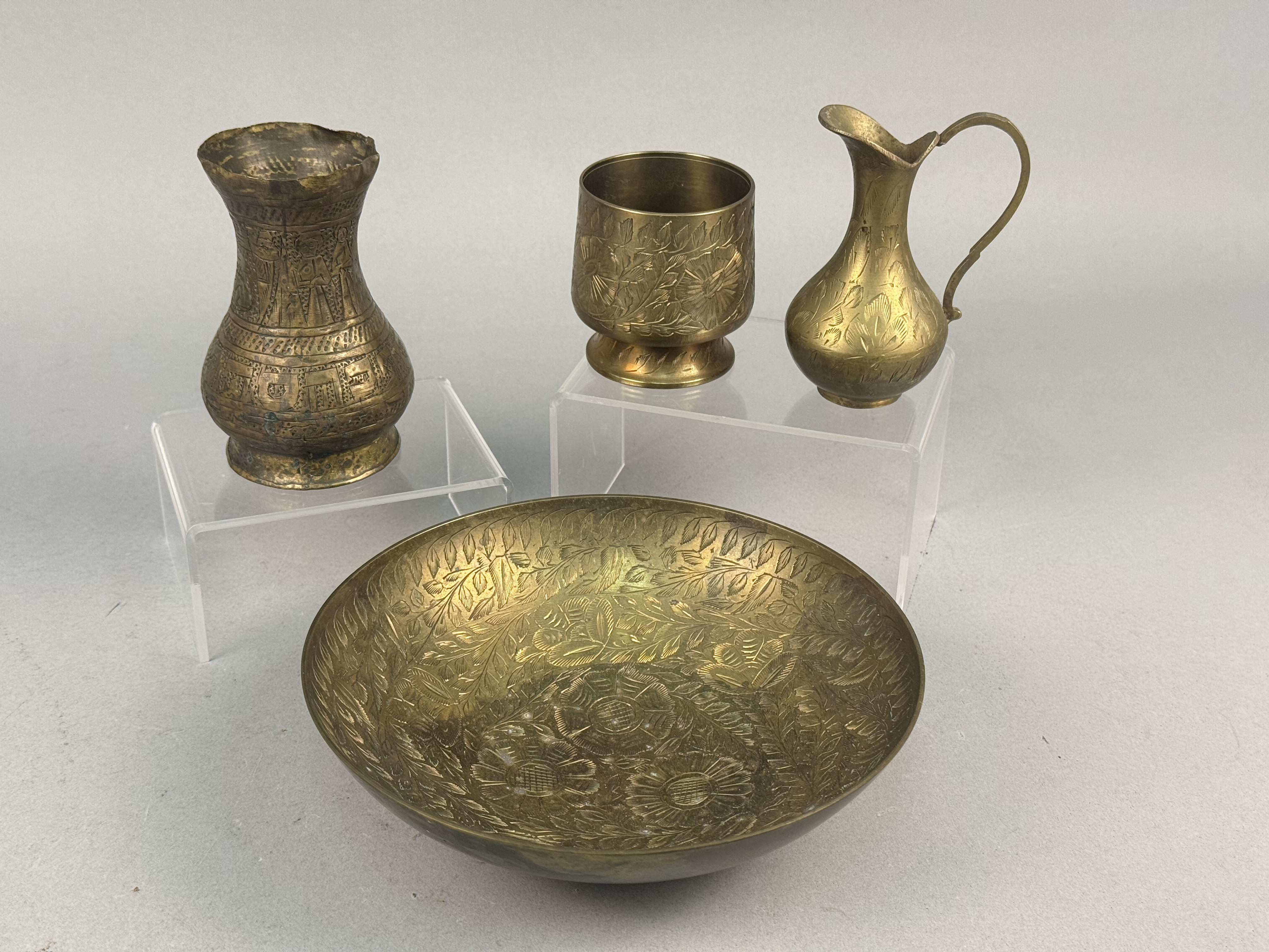 Four Indian Etched Brass Vessels