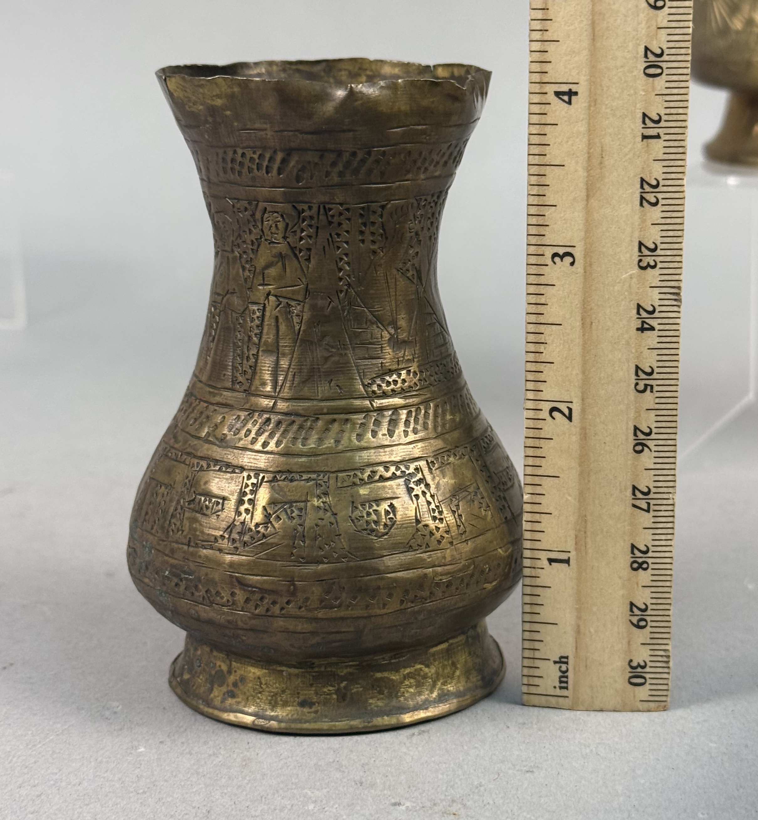 Four Indian Etched Brass Vessels