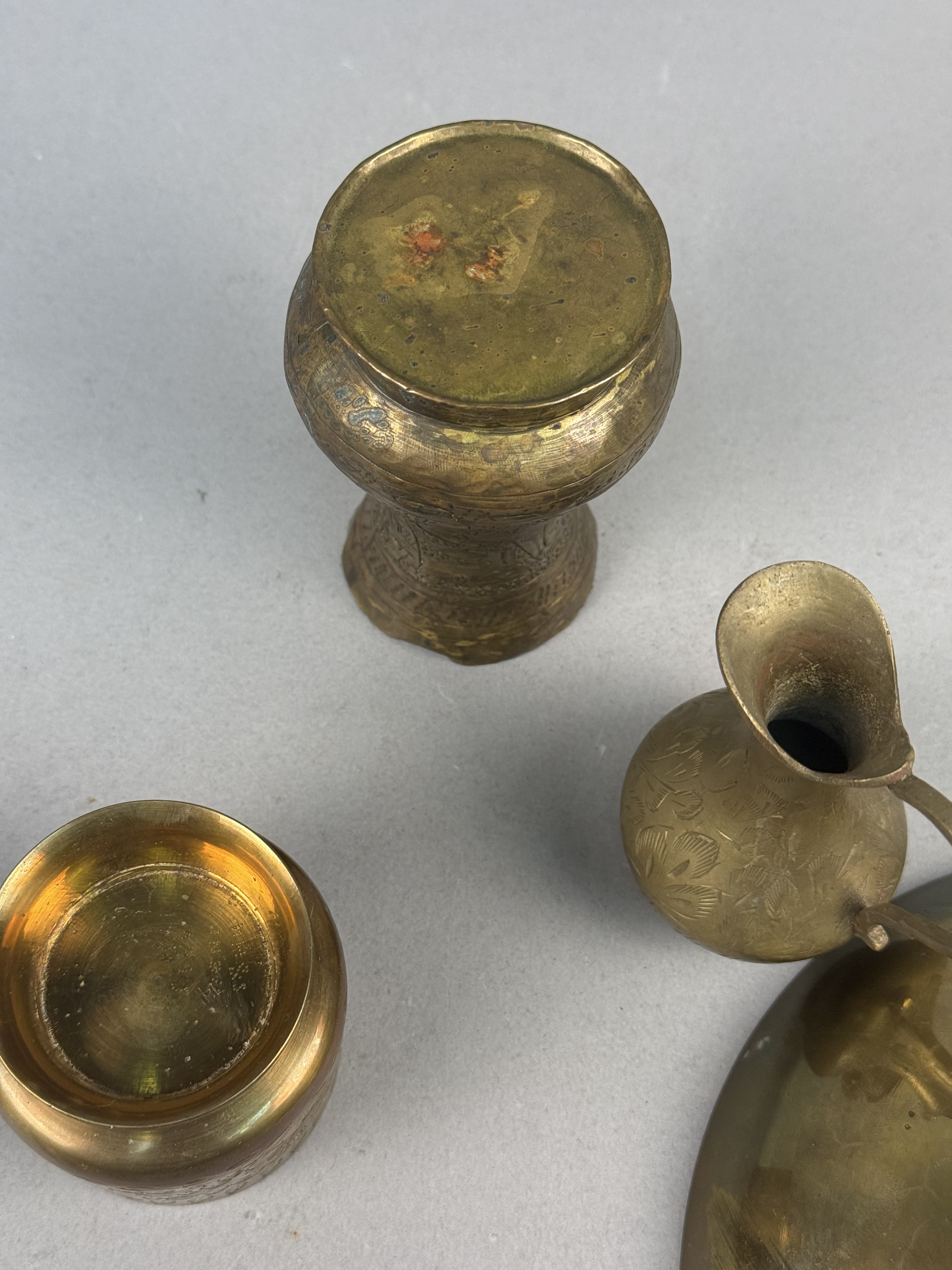 Four Indian Etched Brass Vessels
