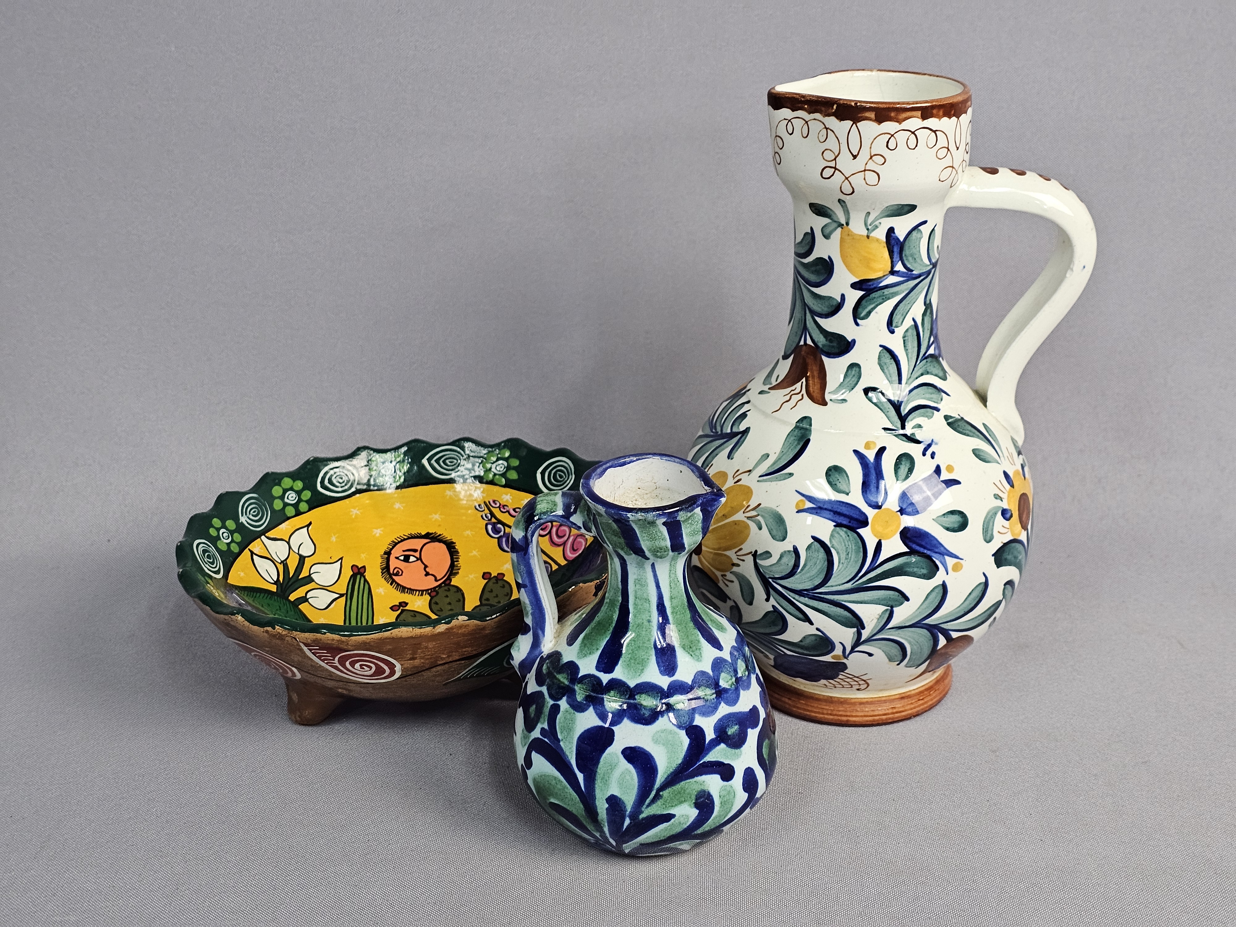 Three Hand-Painted Decorative Ceramic Vessels