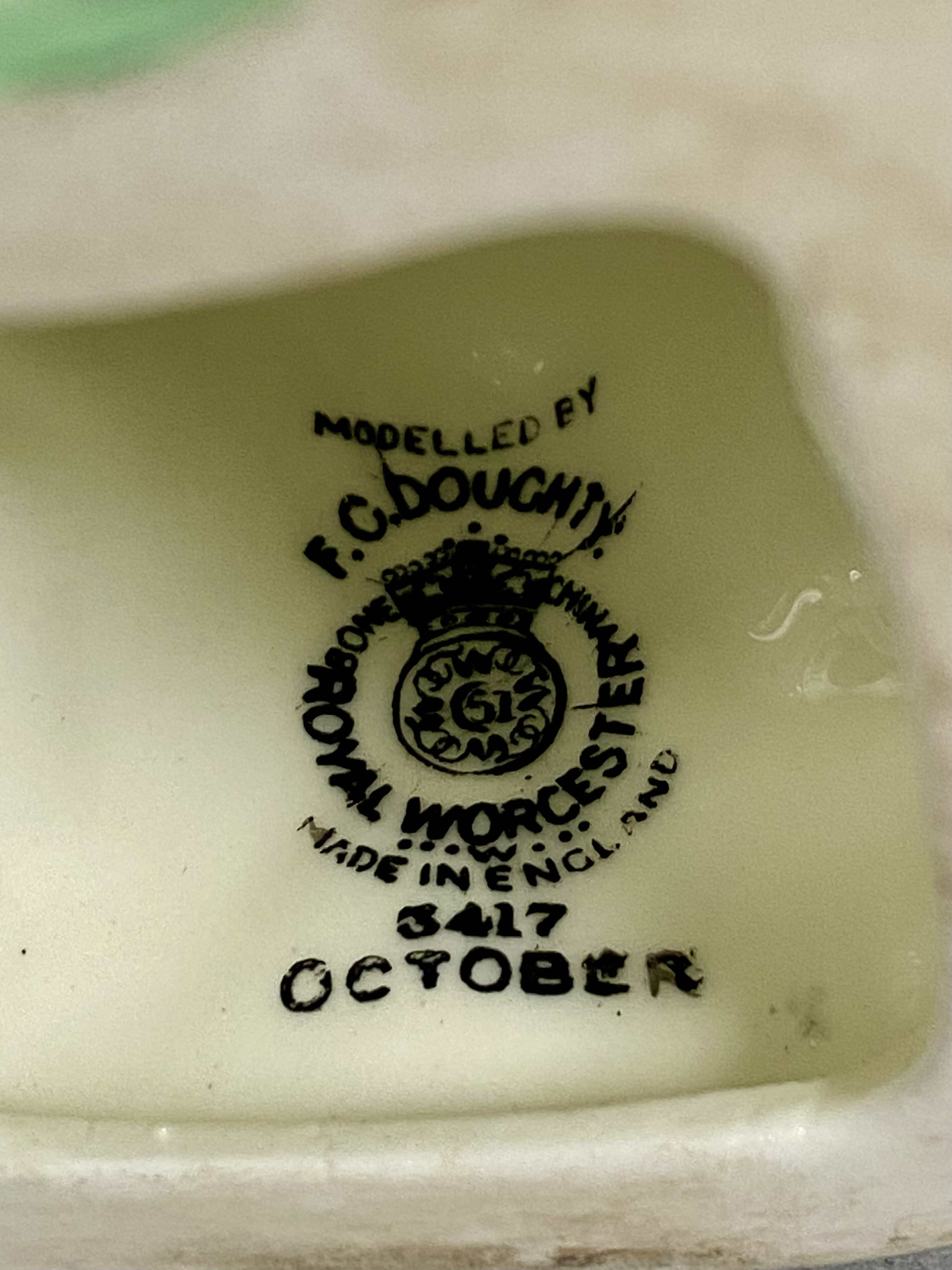 Royal Worcester "October "Figurine by F. G. Doughty