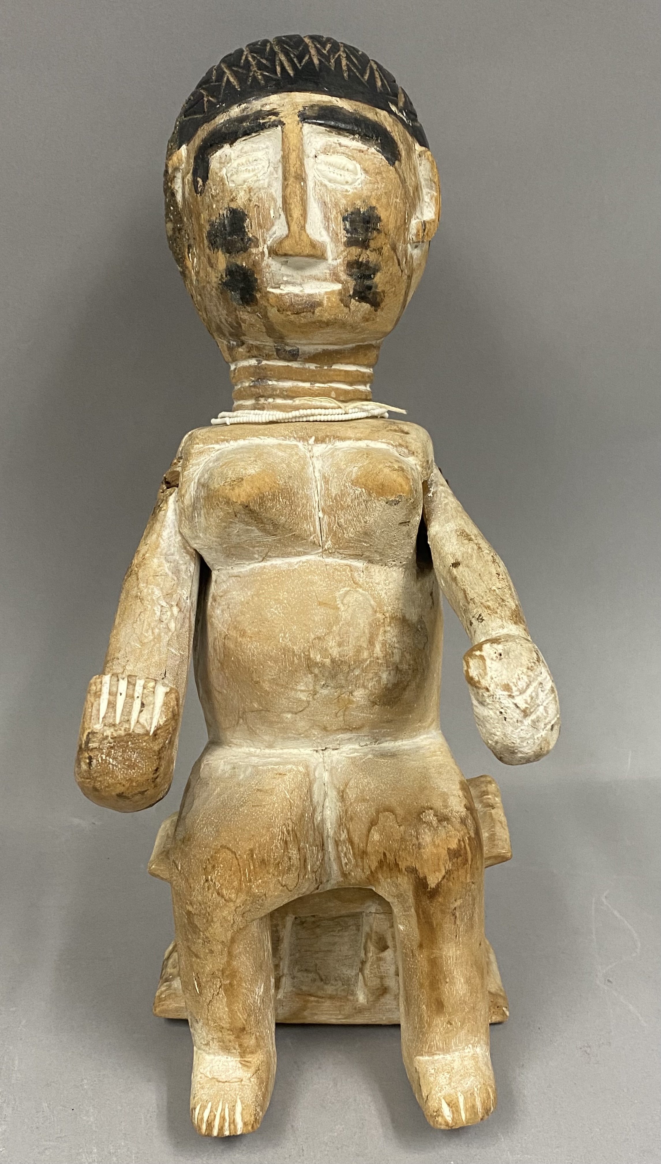 West African Carved Wood Female Figure on Stool