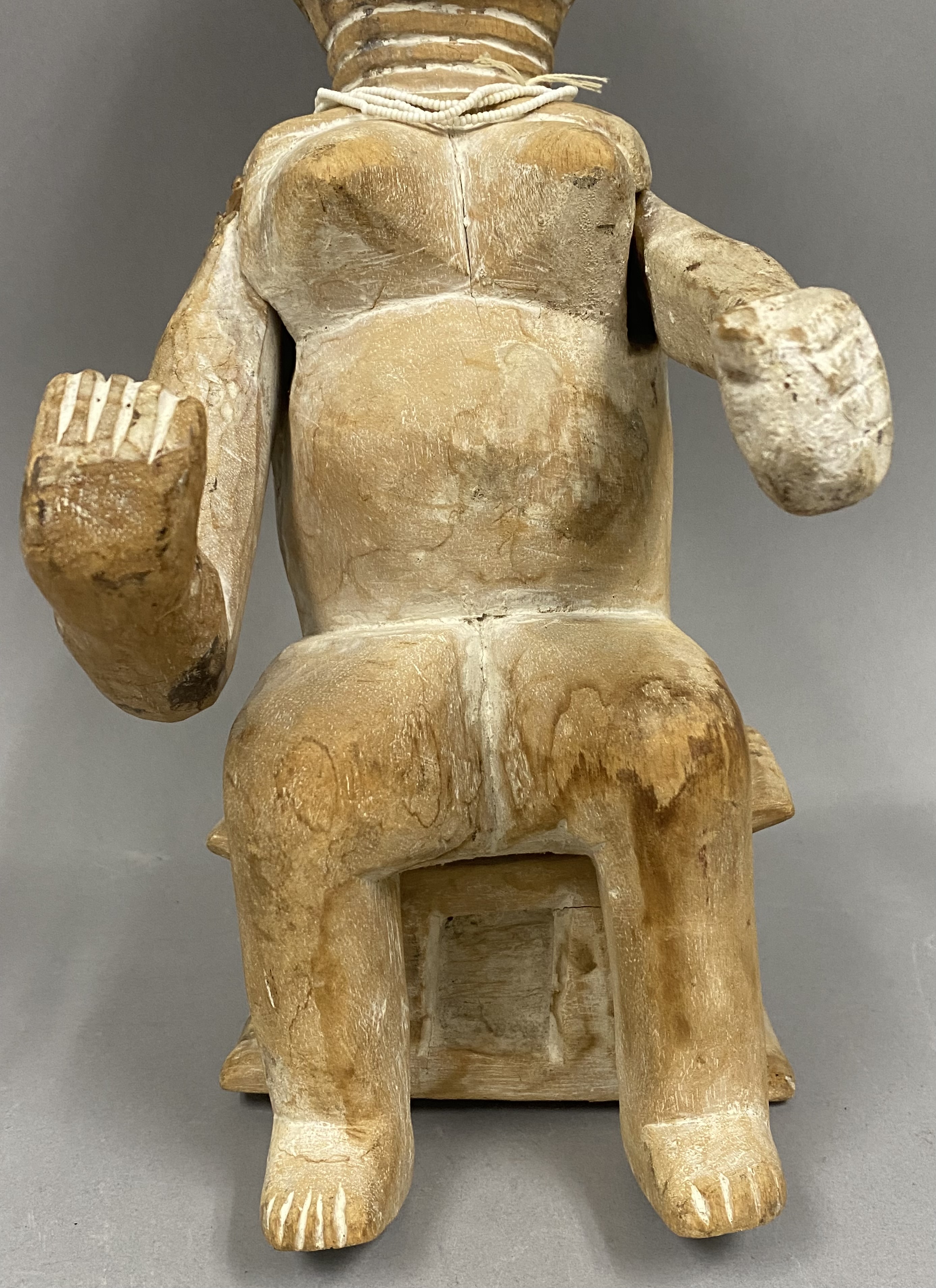 West African Carved Wood Female Figure on Stool