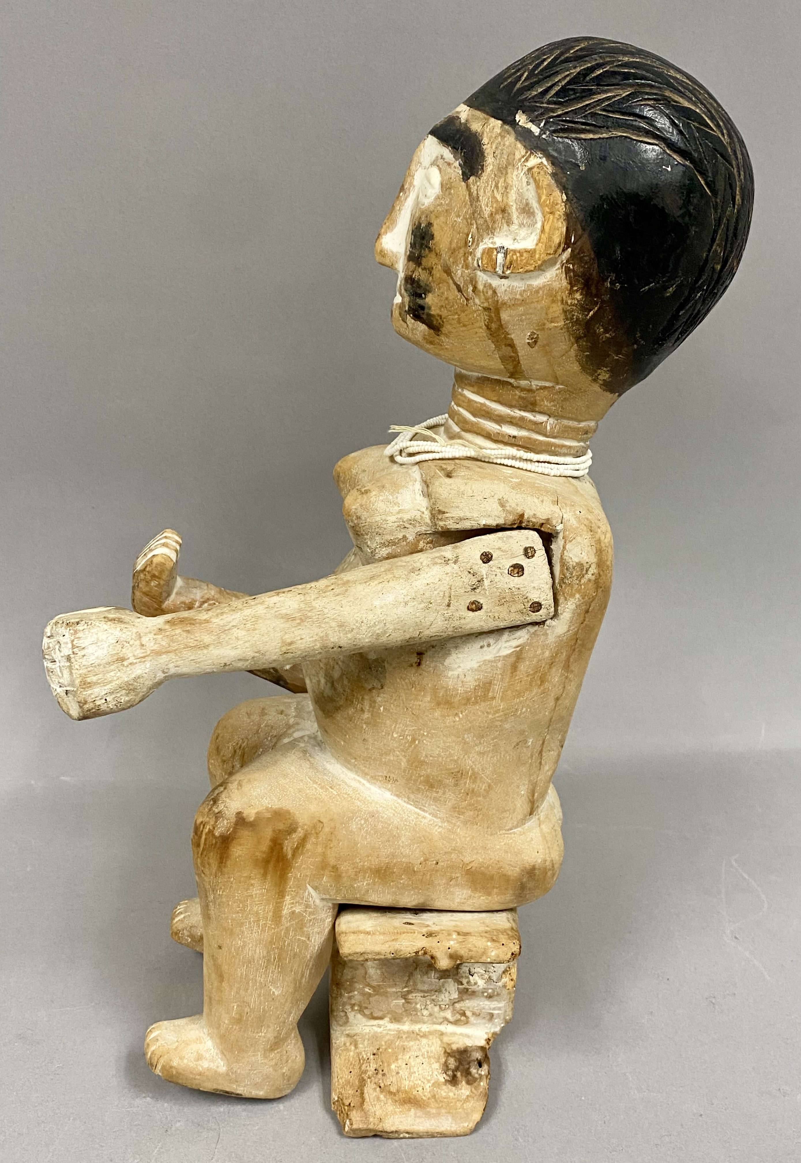 West African Carved Wood Female Figure on Stool