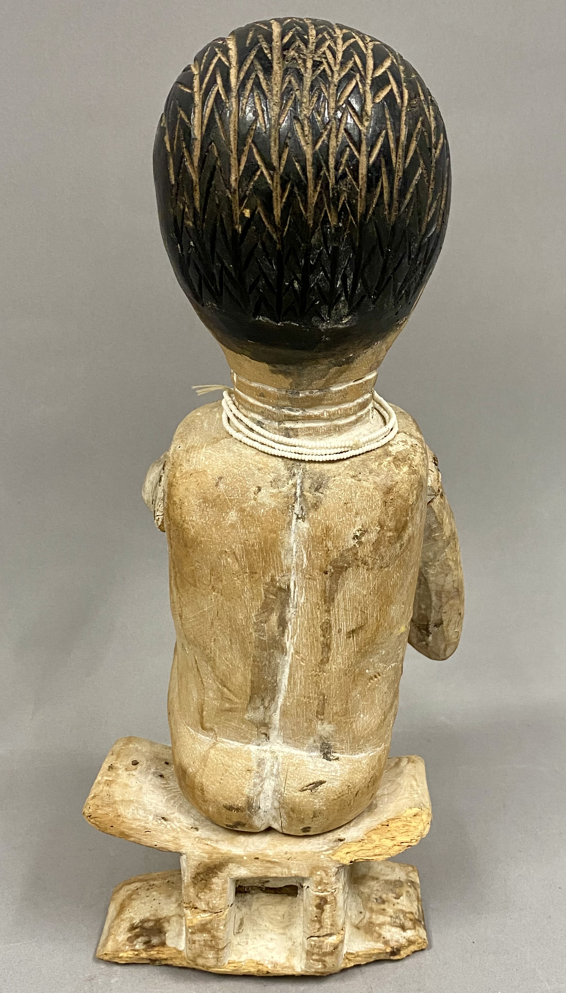 West African Carved Wood Female Figure on Stool