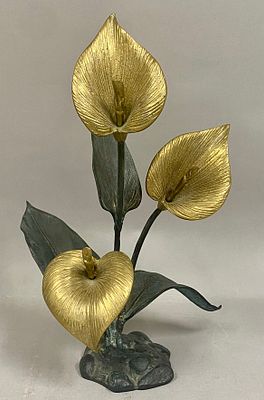 Two-Tone Calla Lily Sculpture. This cast metal botanical sculpture depicts three calla lilies 