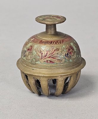 Vintage Indian Etched Brass Claw Bell. A vintage Indian cast brass claw bell featuring a domed 