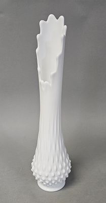Fenton Milk Glass Hobnail Swung Vase. This Fenton milk glass swung vase features a traditional 