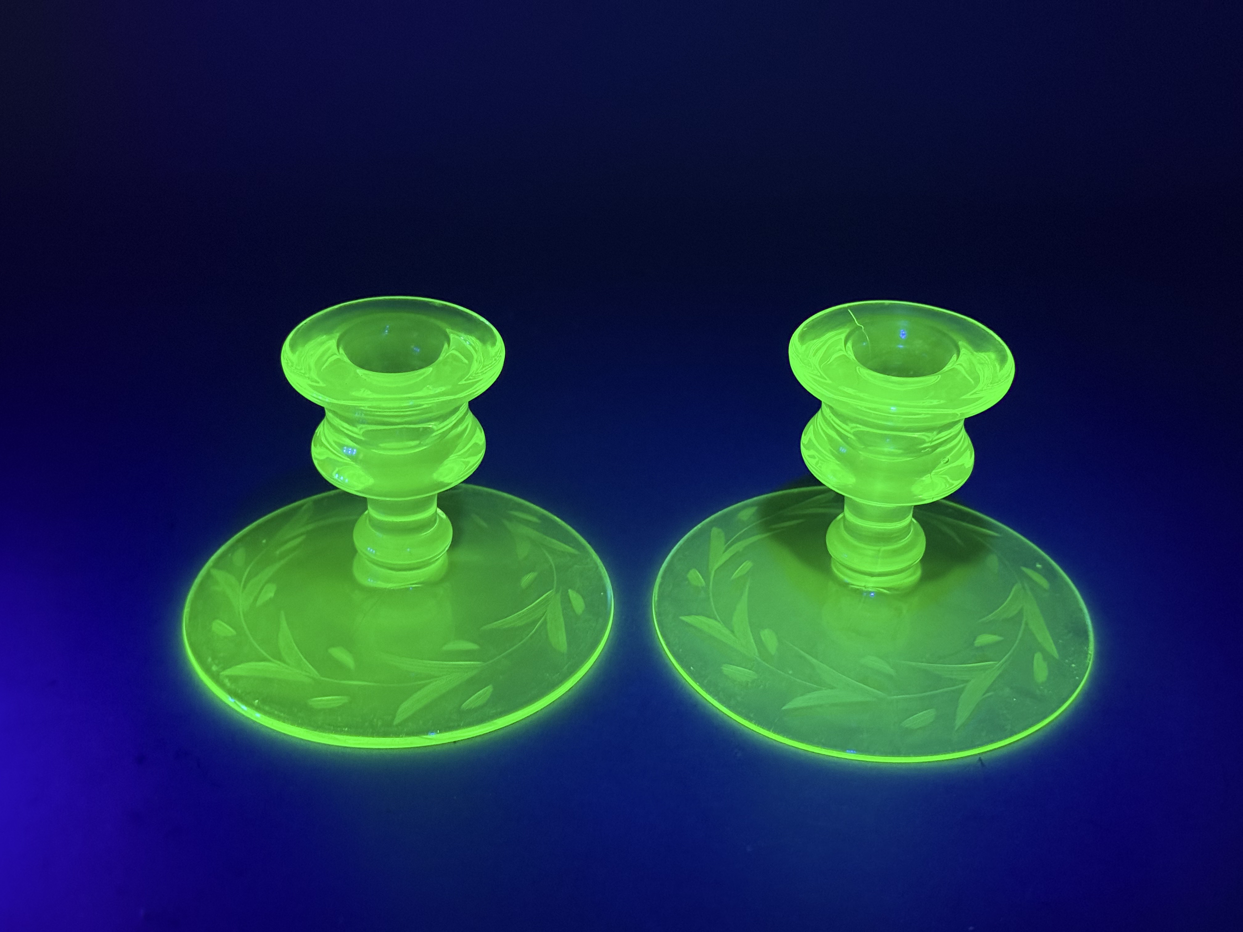 Pair of Etched Uranium Glass Candlesticks