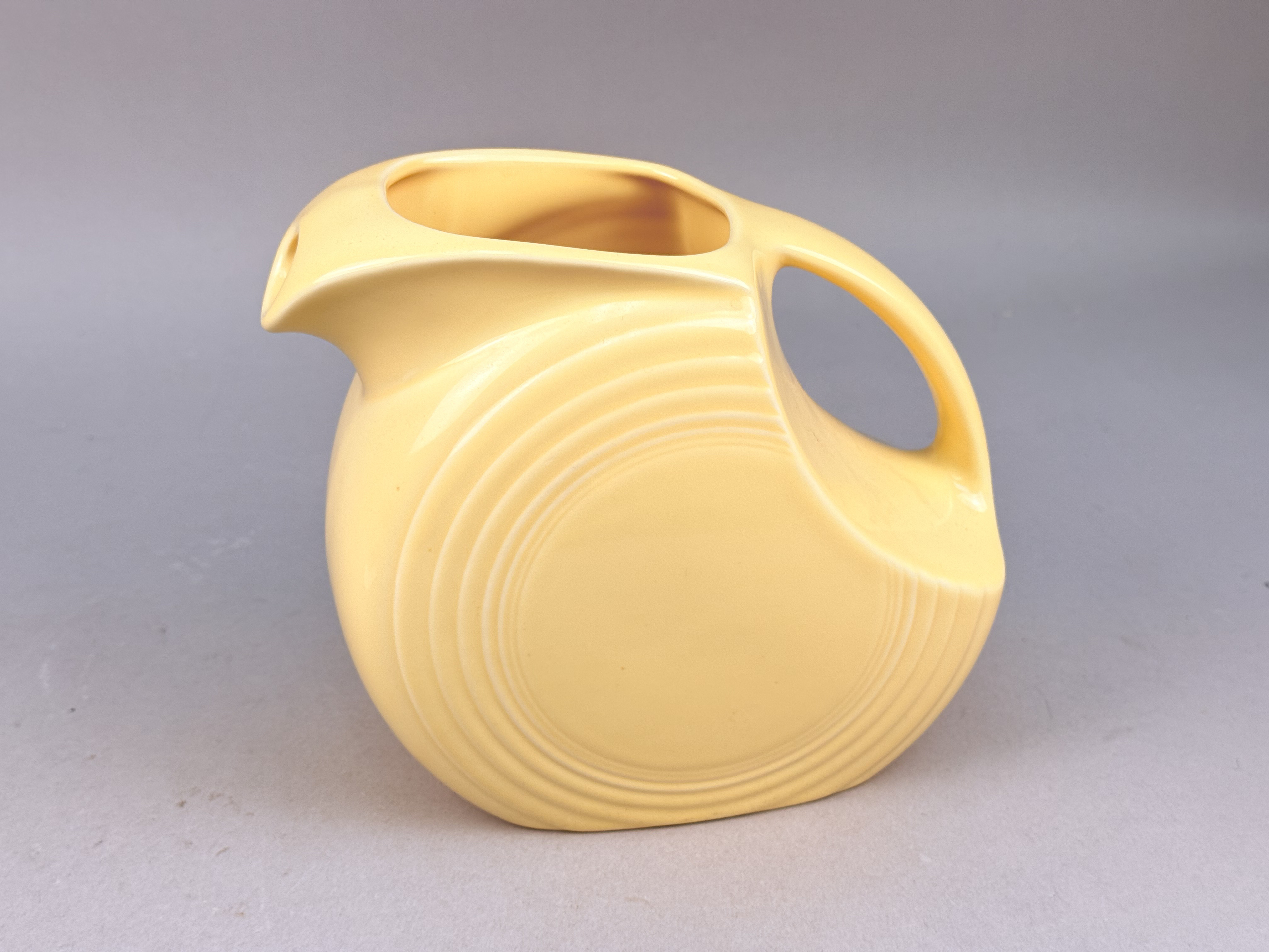 Homer Laughlin Fiesta Yellow Disk Pitcher